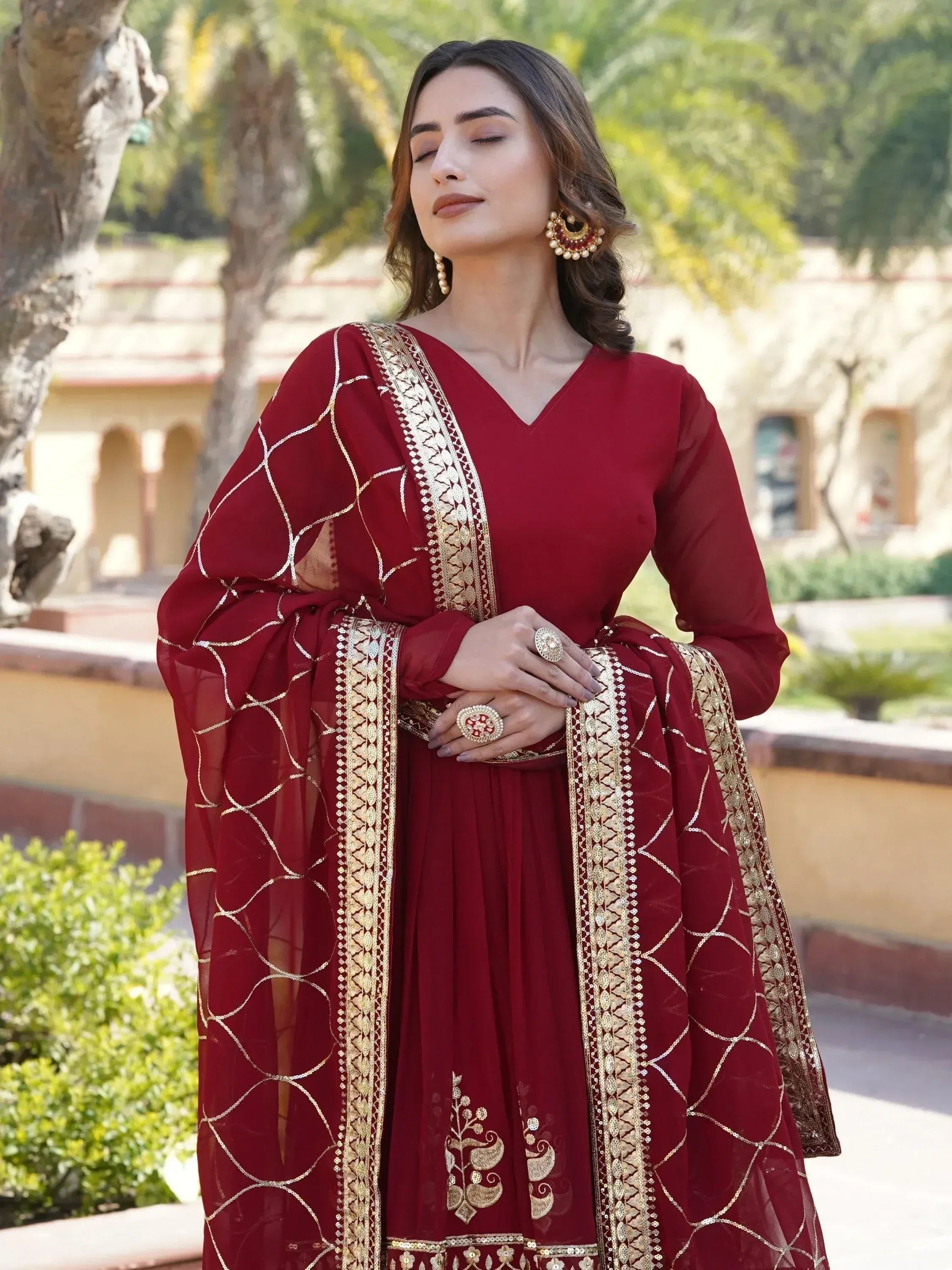 Maroon Indian ethnic wear with gold embroidery, perfect for weddings and festive occasions