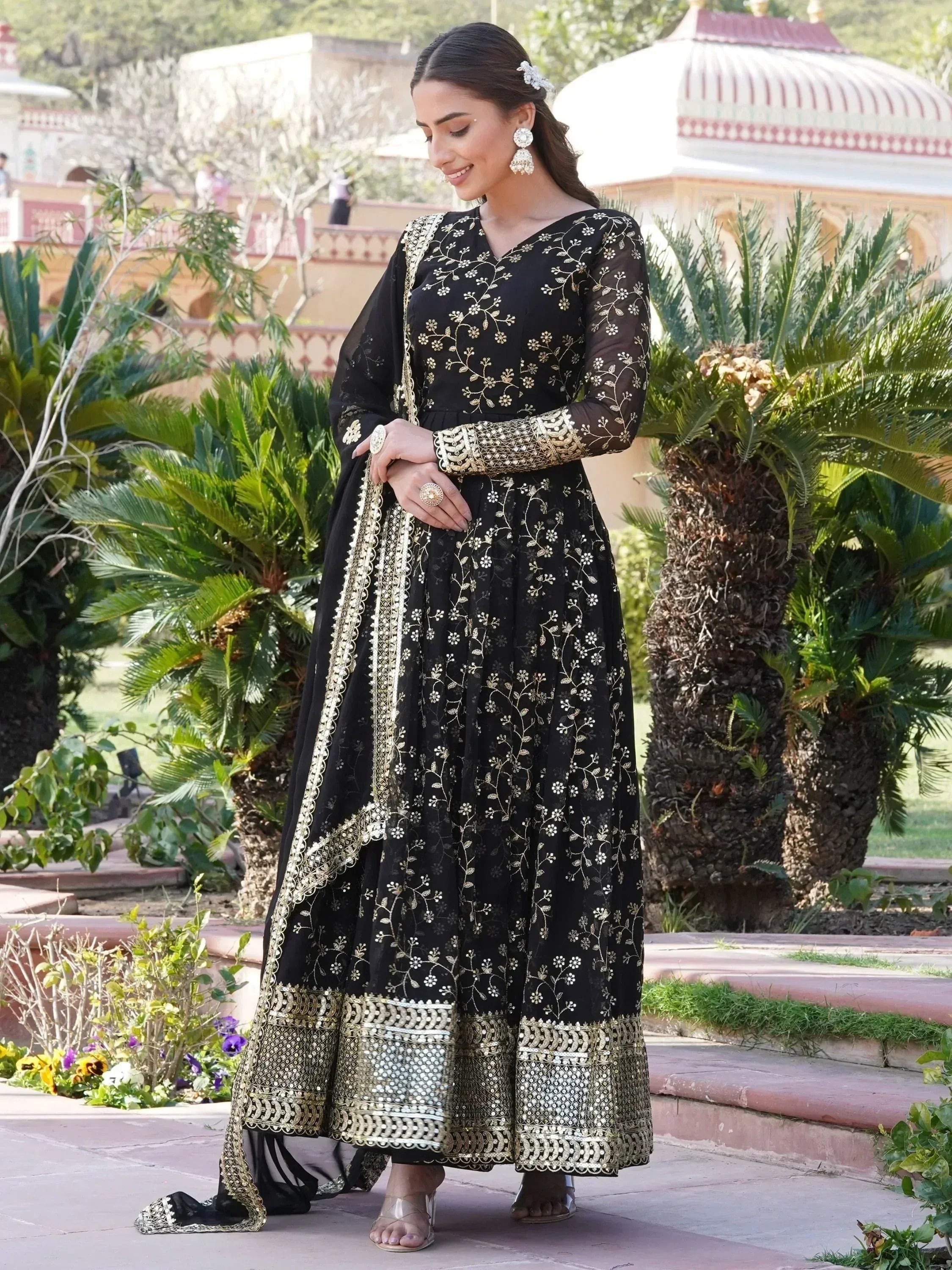 Black and gold embroidered anarkali suit with mirror work, perfect for Indian ethnic wear occasions