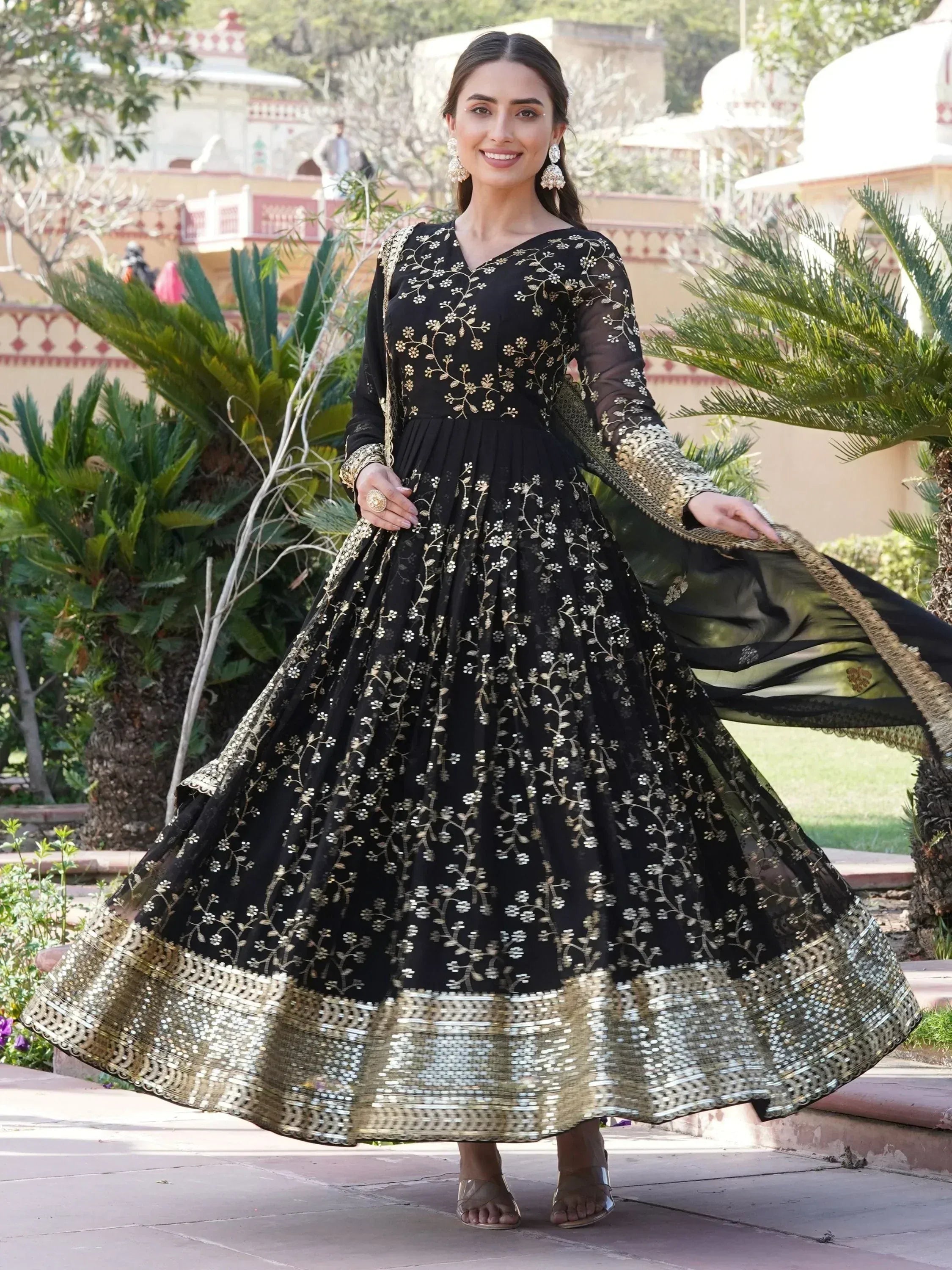 Black and gold embroidered anarkali gown with floral zari work, perfect for Indian ethnic occasions