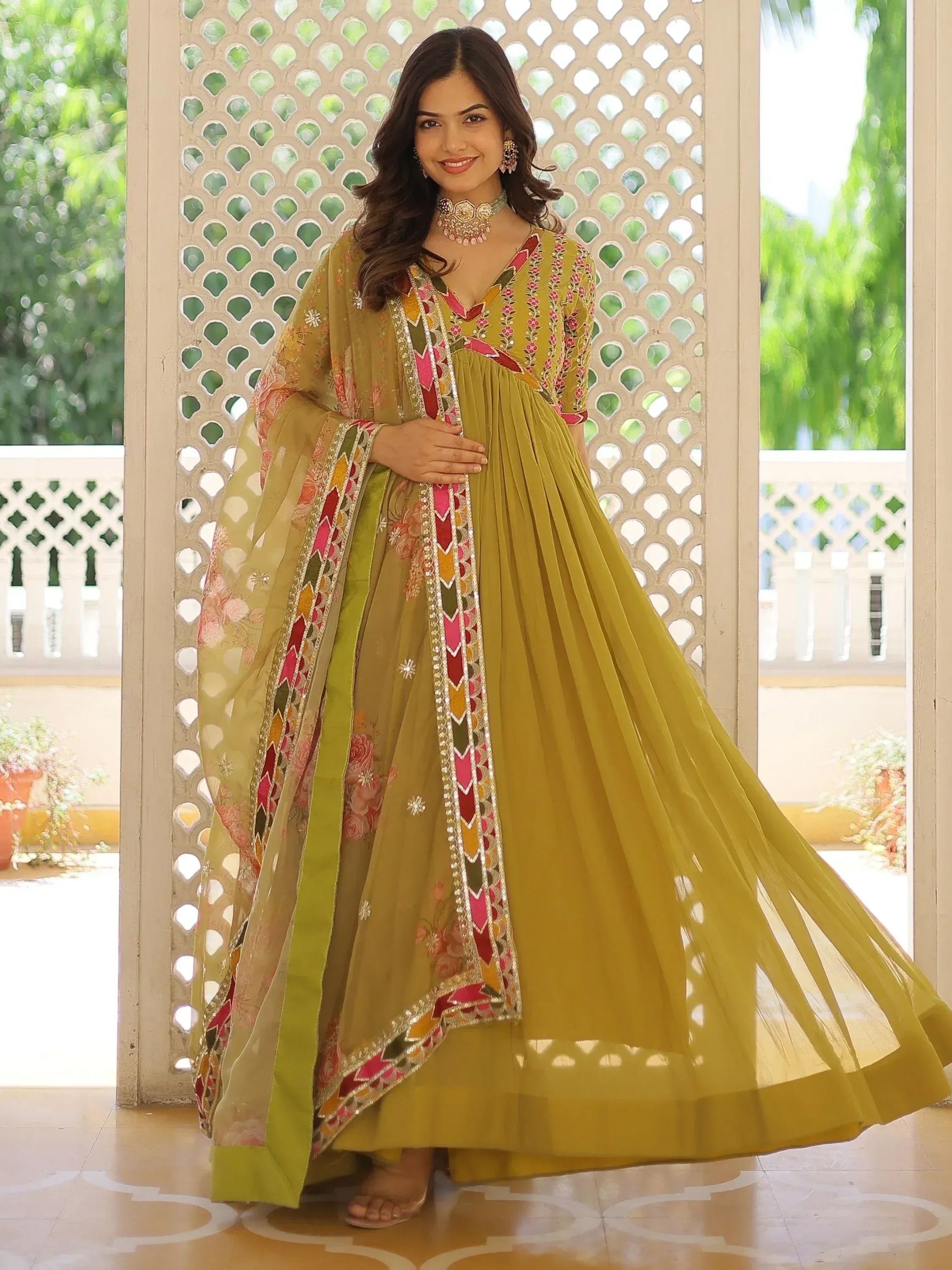 Yellow embroidered anarkali suit with floral dupatta, perfect for Indian ethnic occasions