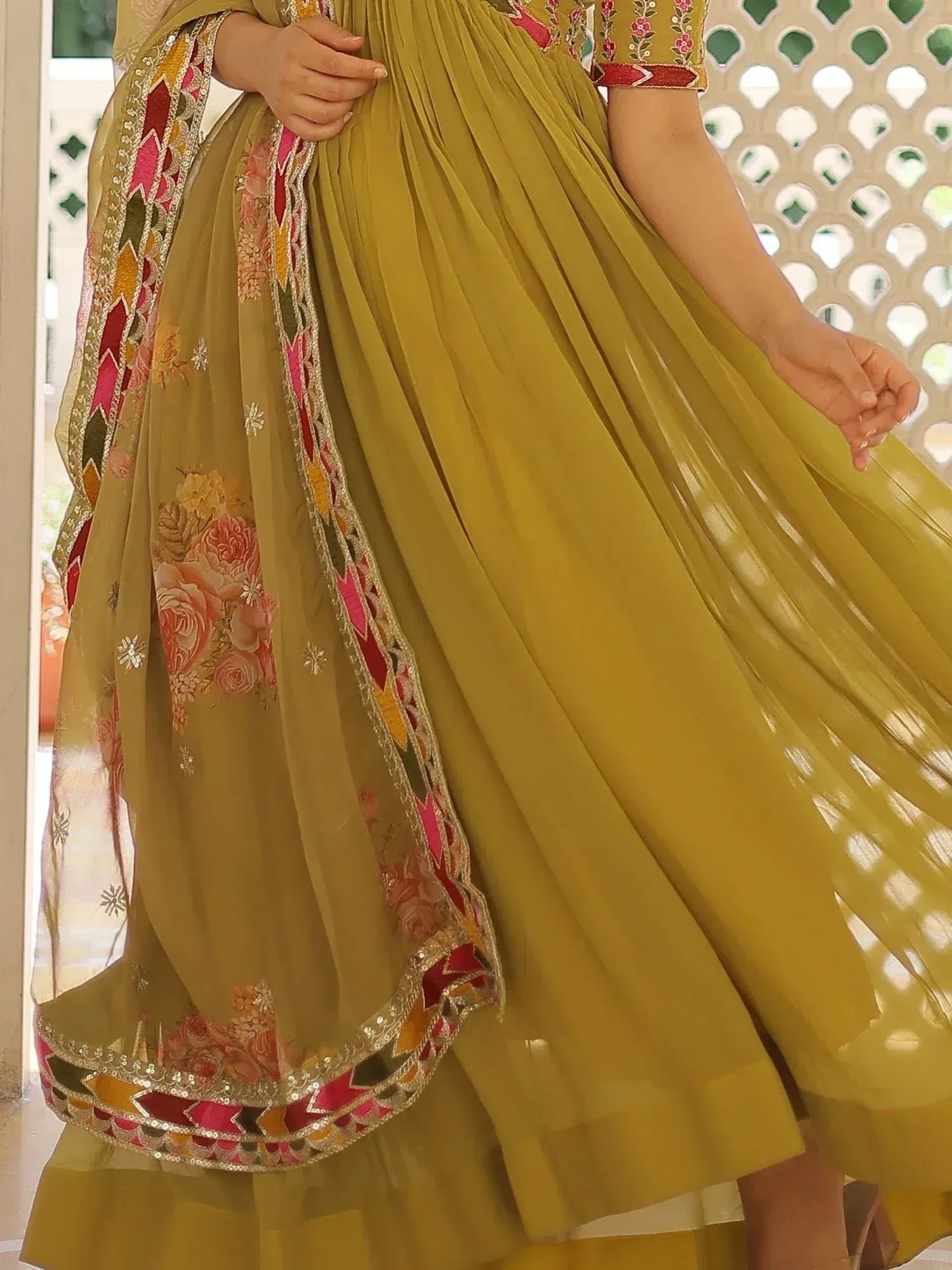 Mustard yellow pleated lehenga with floral dupatta, perfect for Indian ethnic wear occasions