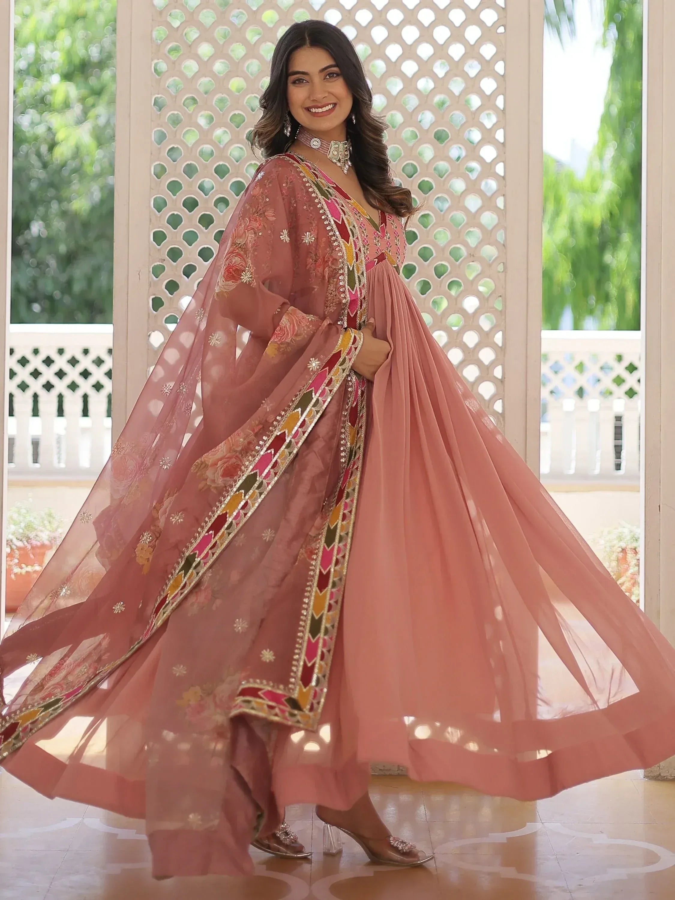 Pink embroidered anarkali suit with floral dupatta, perfect for Indian ethnic wear occasions