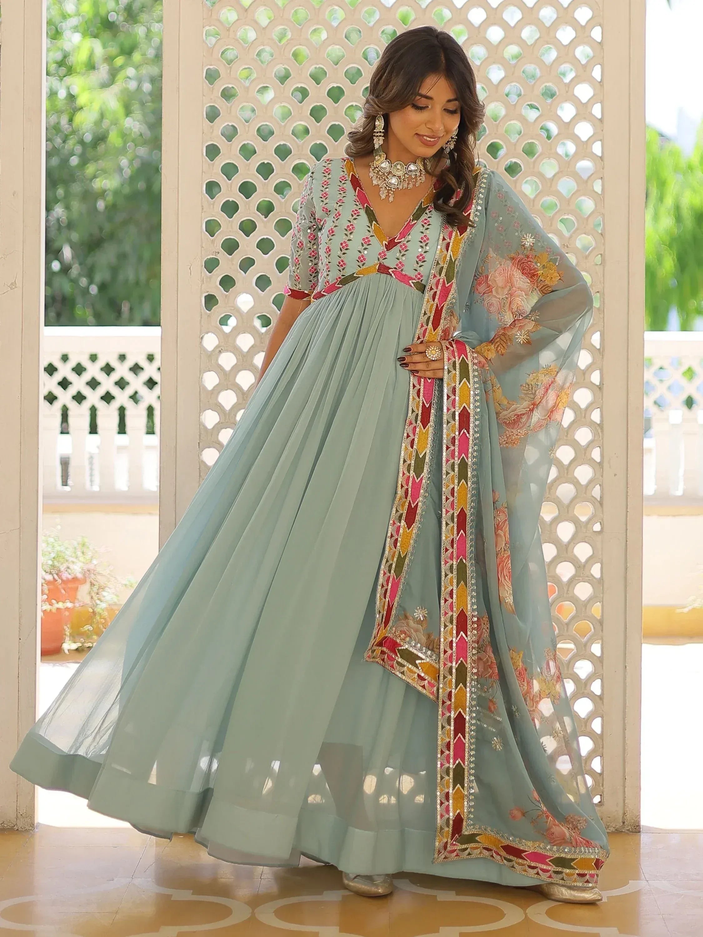 Mint green embroidered anarkali gown with floral dupatta, perfect for Indian ethnic occasions