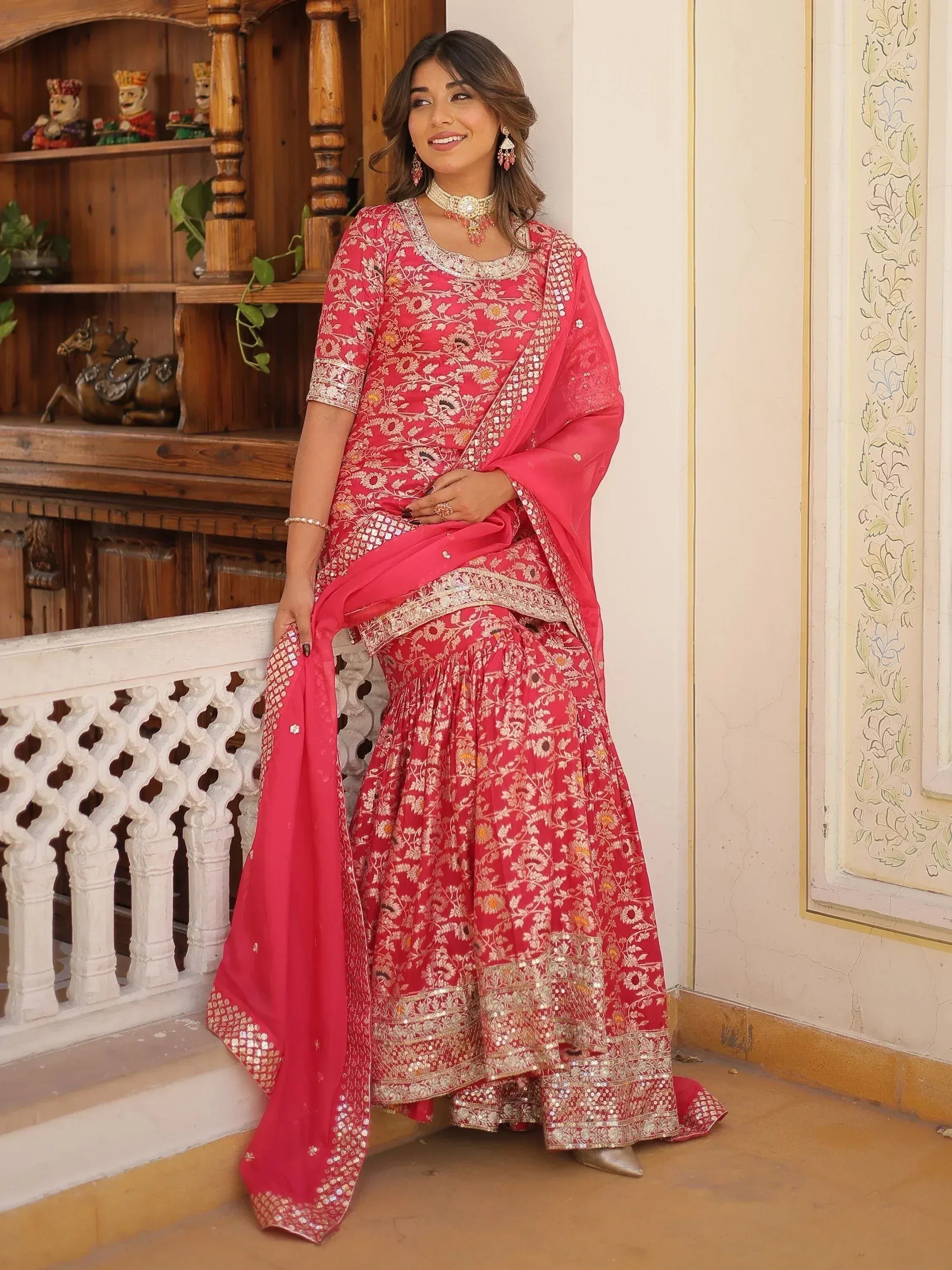 Pink floral embroidered lehenga choli with gold detailing, perfect for Indian ethnic occasions