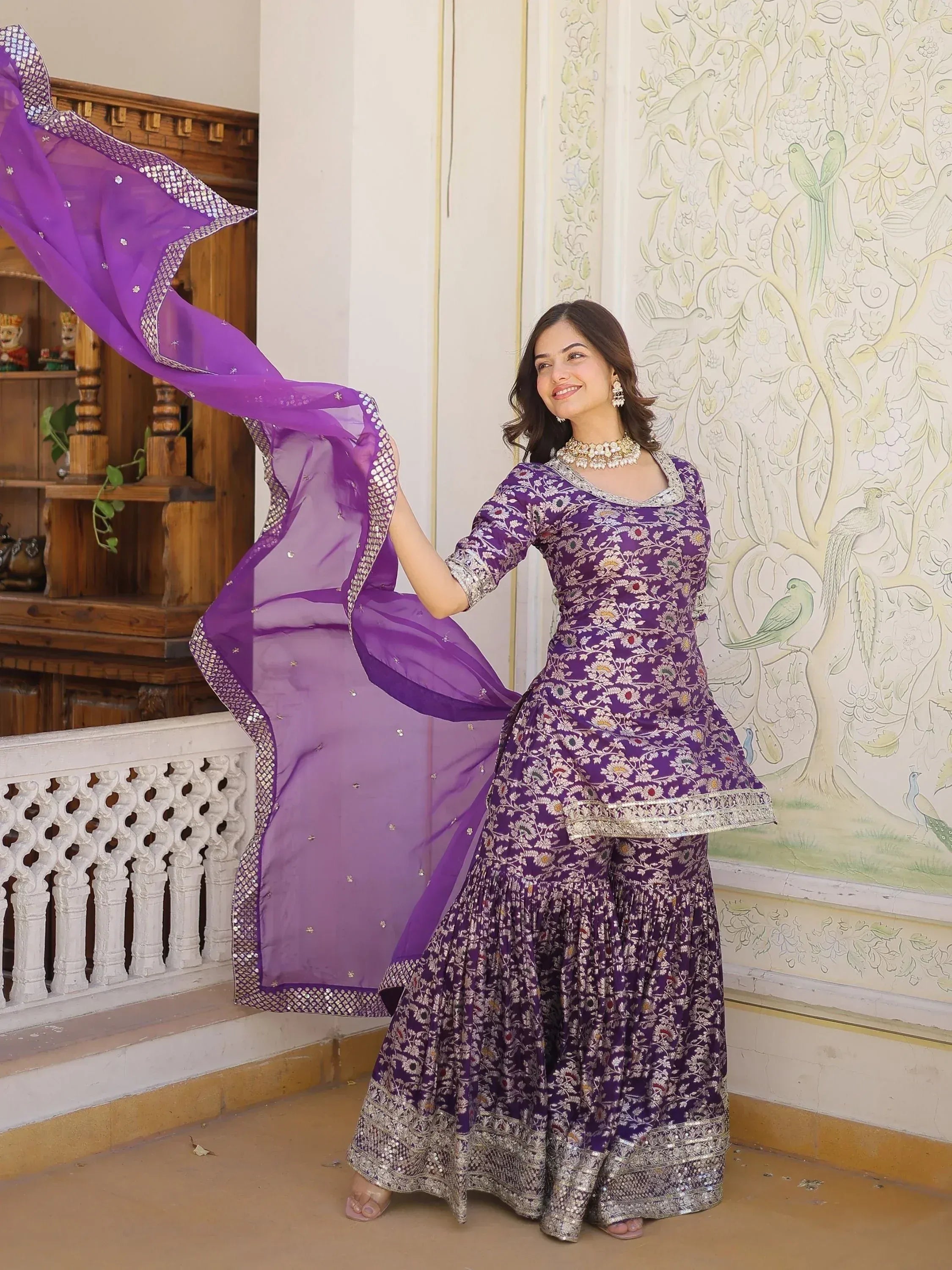 Purple floral embroidered Indian sharara suit with dupatta, perfect for festive occasions