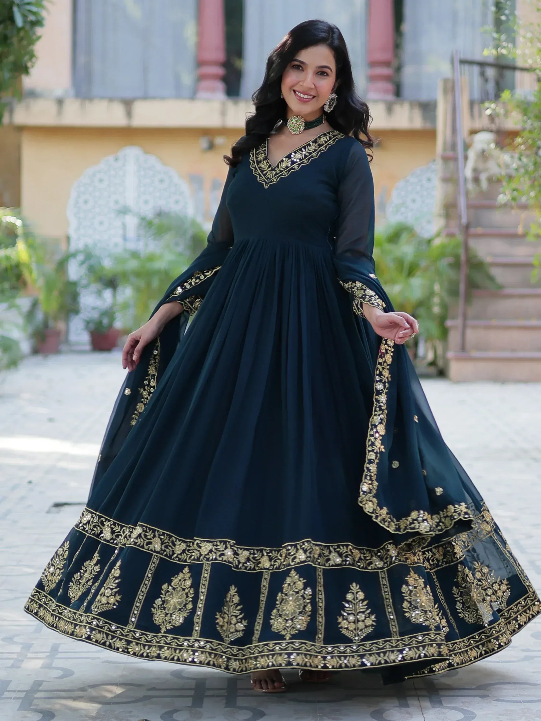 Elegant navy blue anarkali gown with gold embroidery, perfect for Indian ethnic occasions