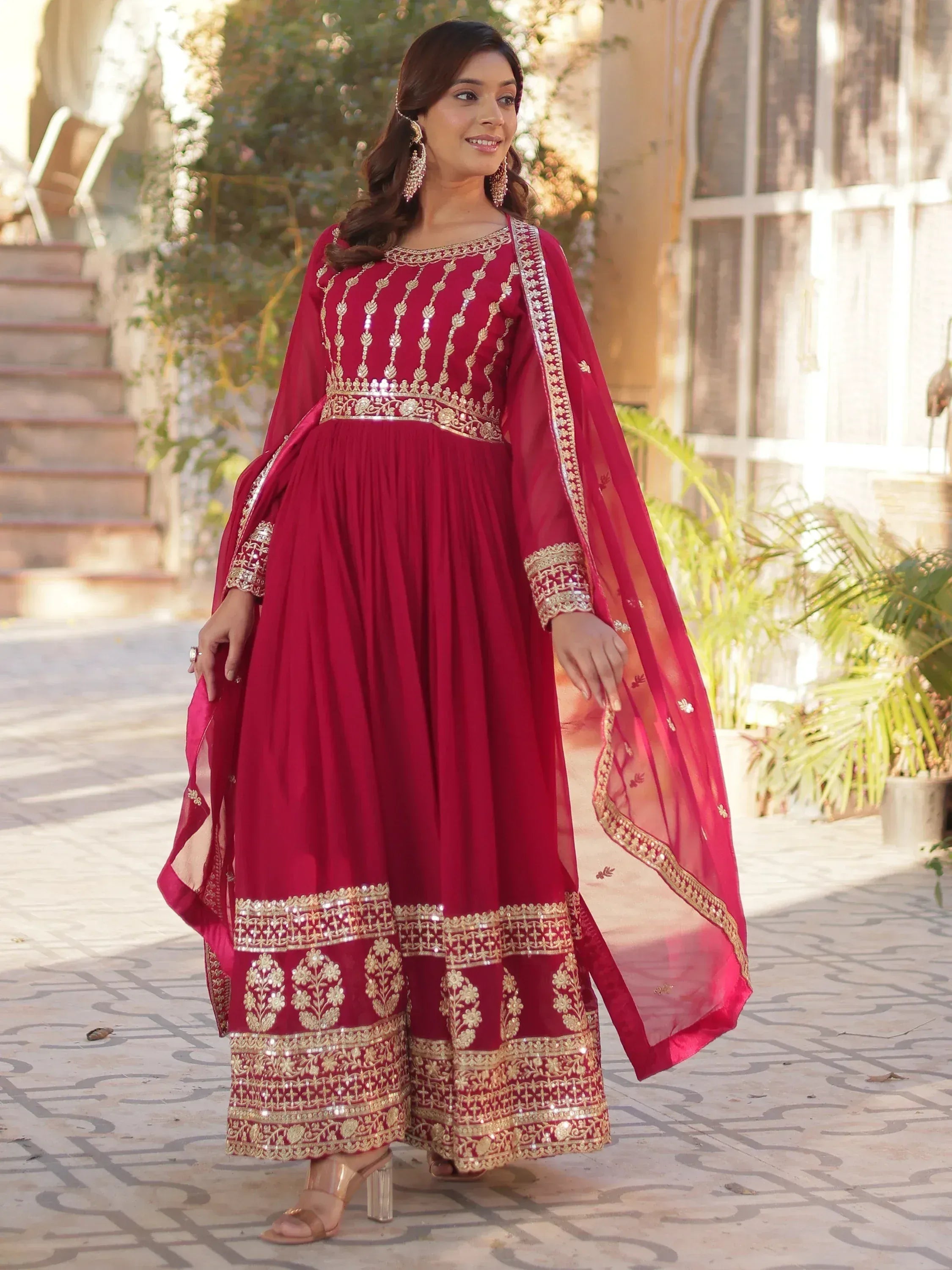 Elegant maroon anarkali suit with gold embroidery and dupatta, perfect for Indian ethnic occasions