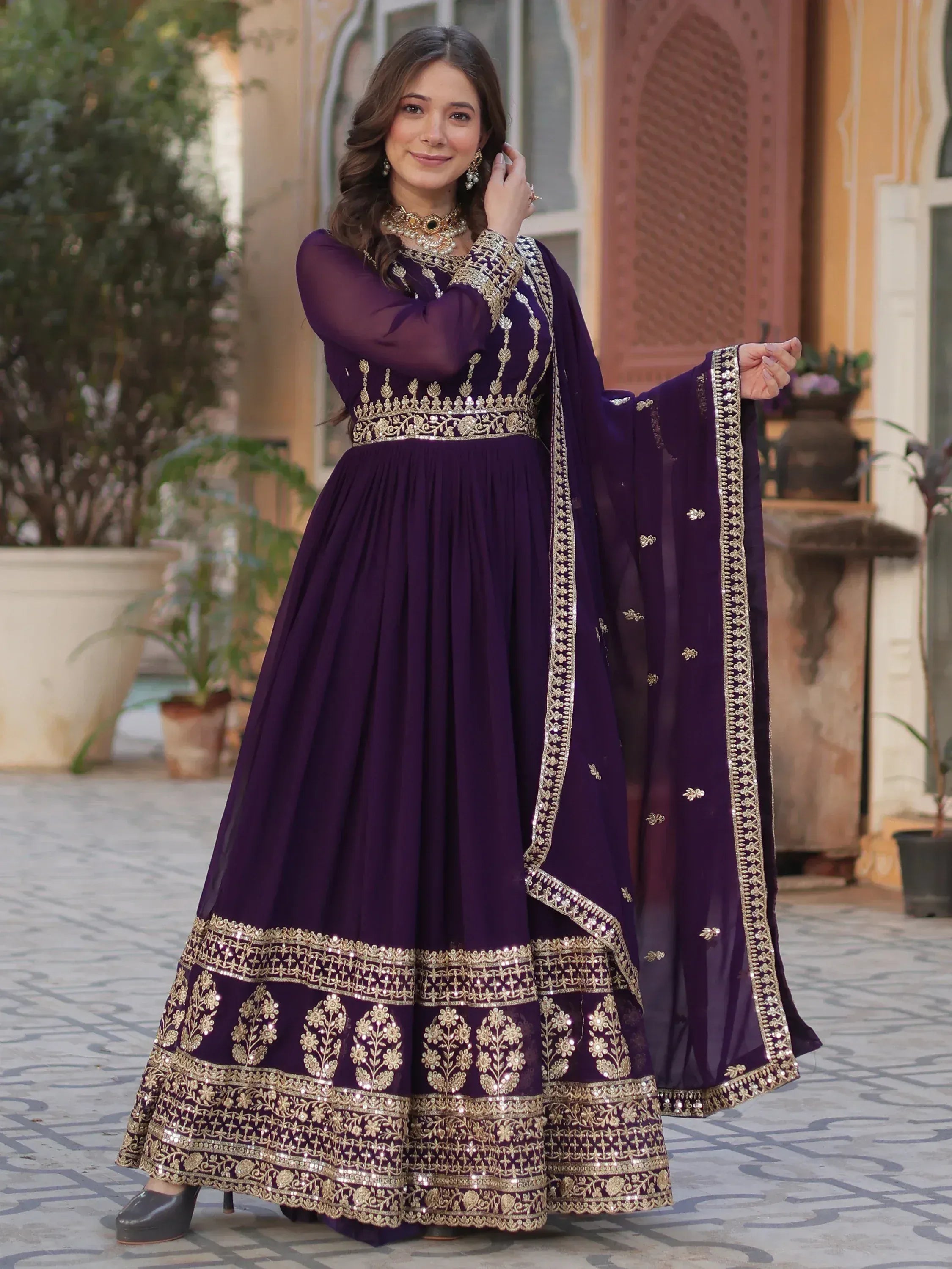 Purple ethnic anarkali with gold embroidery and dupatta, perfect for Indian occasions and festivals.