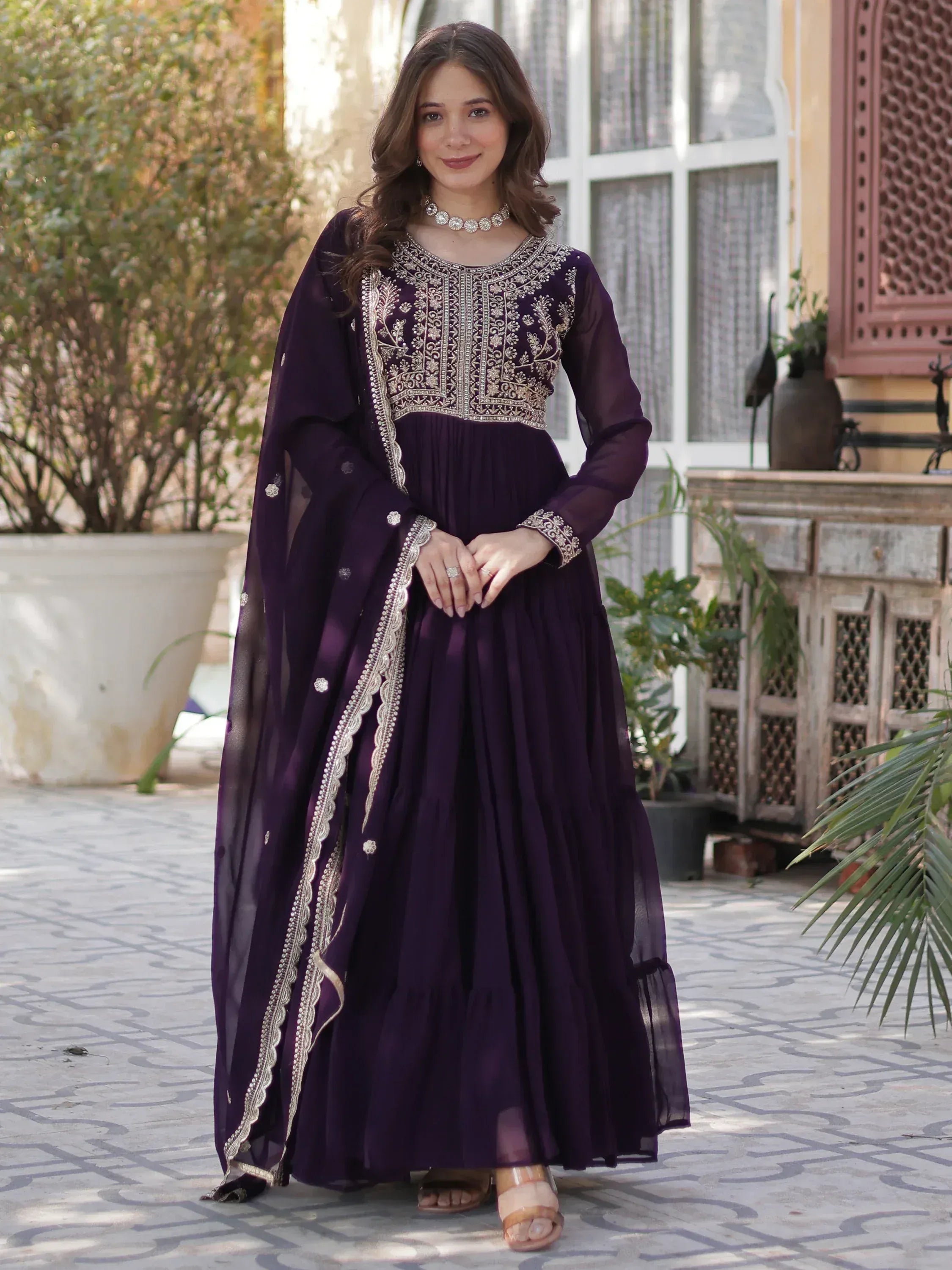 Purple embroidered anarkali suit with gold detailing, perfect for Indian ethnic wear occasions.
