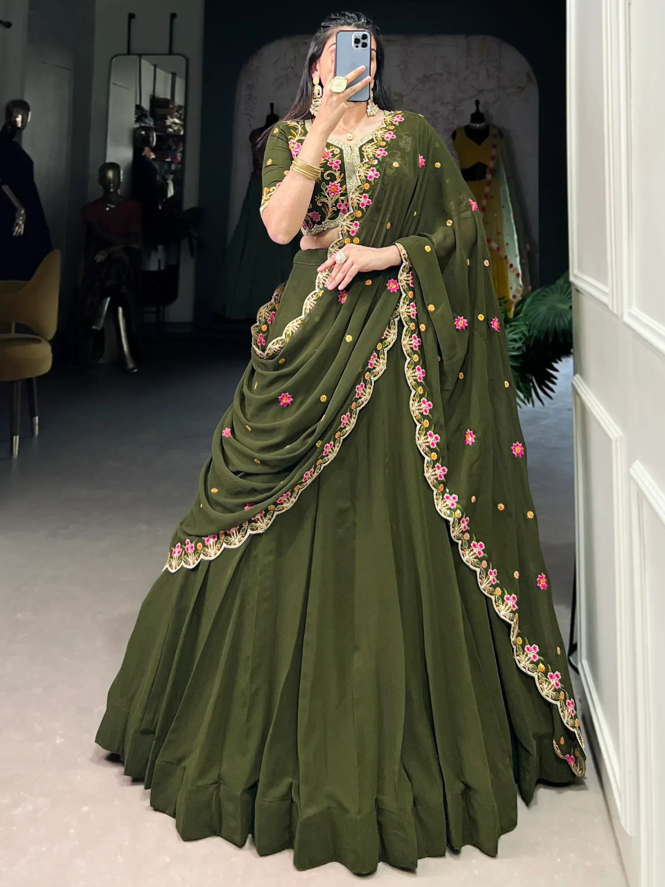 Olive green embroidered lehenga choli with floral motifs, perfect for Indian ethnic wear and festive occasions.