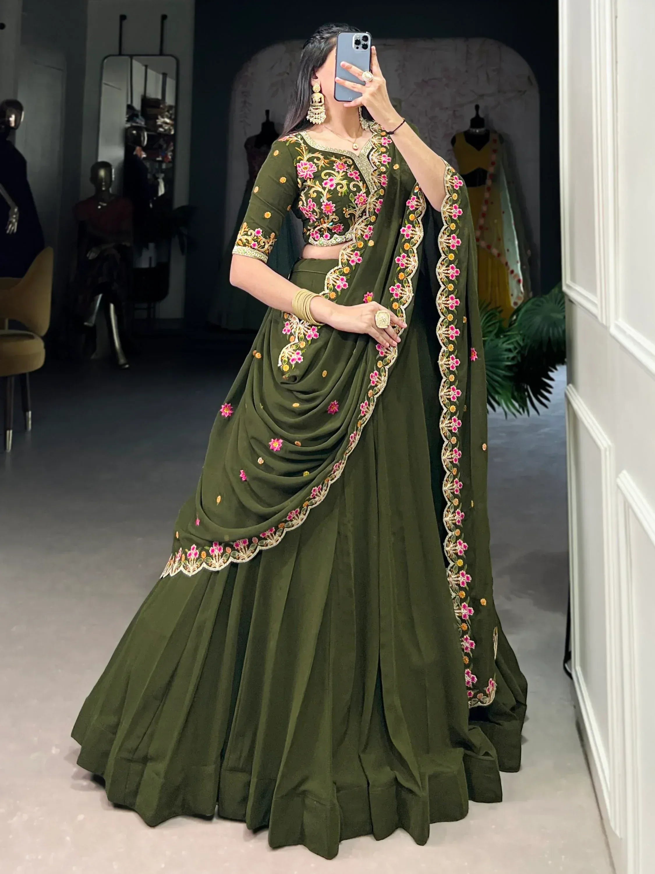 Olive green embroidered lehenga choli with floral motifs, perfect for Indian ethnic wear occasions