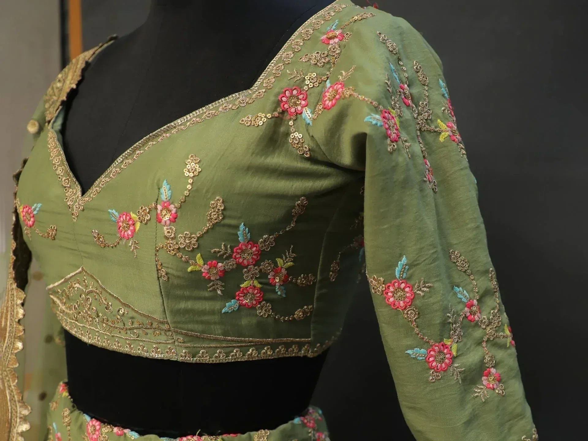 Olive green embroidered blouse with floral zari work, perfect for Indian ethnic wear and designer lehenga choli sets