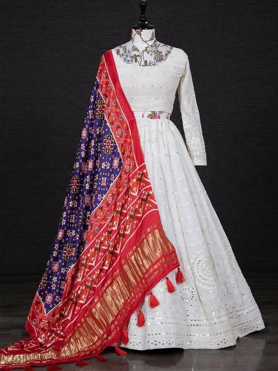 White embroidered lehenga choli with colorful printed dupatta, ethnic Indian wear