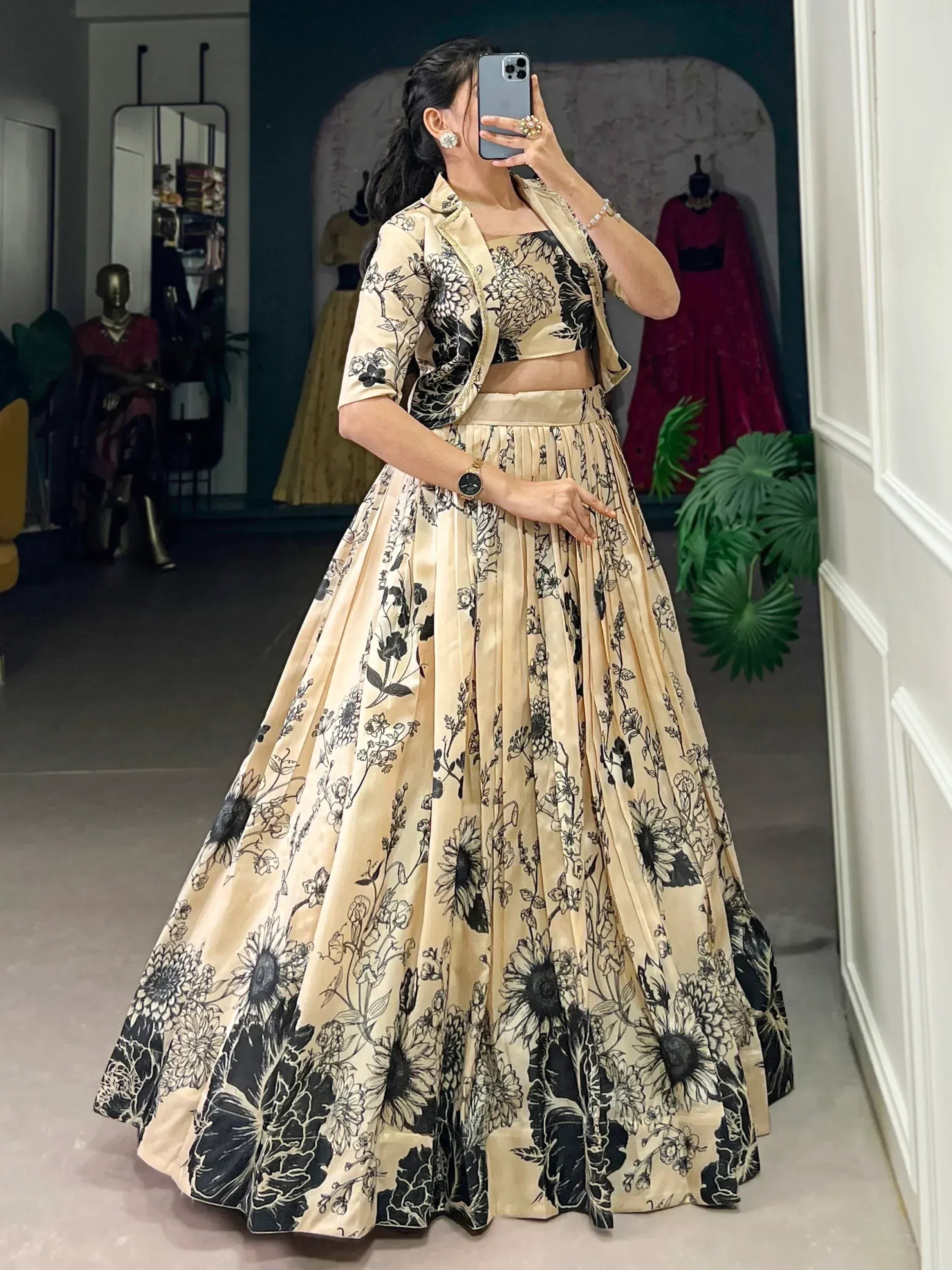Beige floral lehenga choli with black print, perfect for Indian ethnic wear and designer occasions.