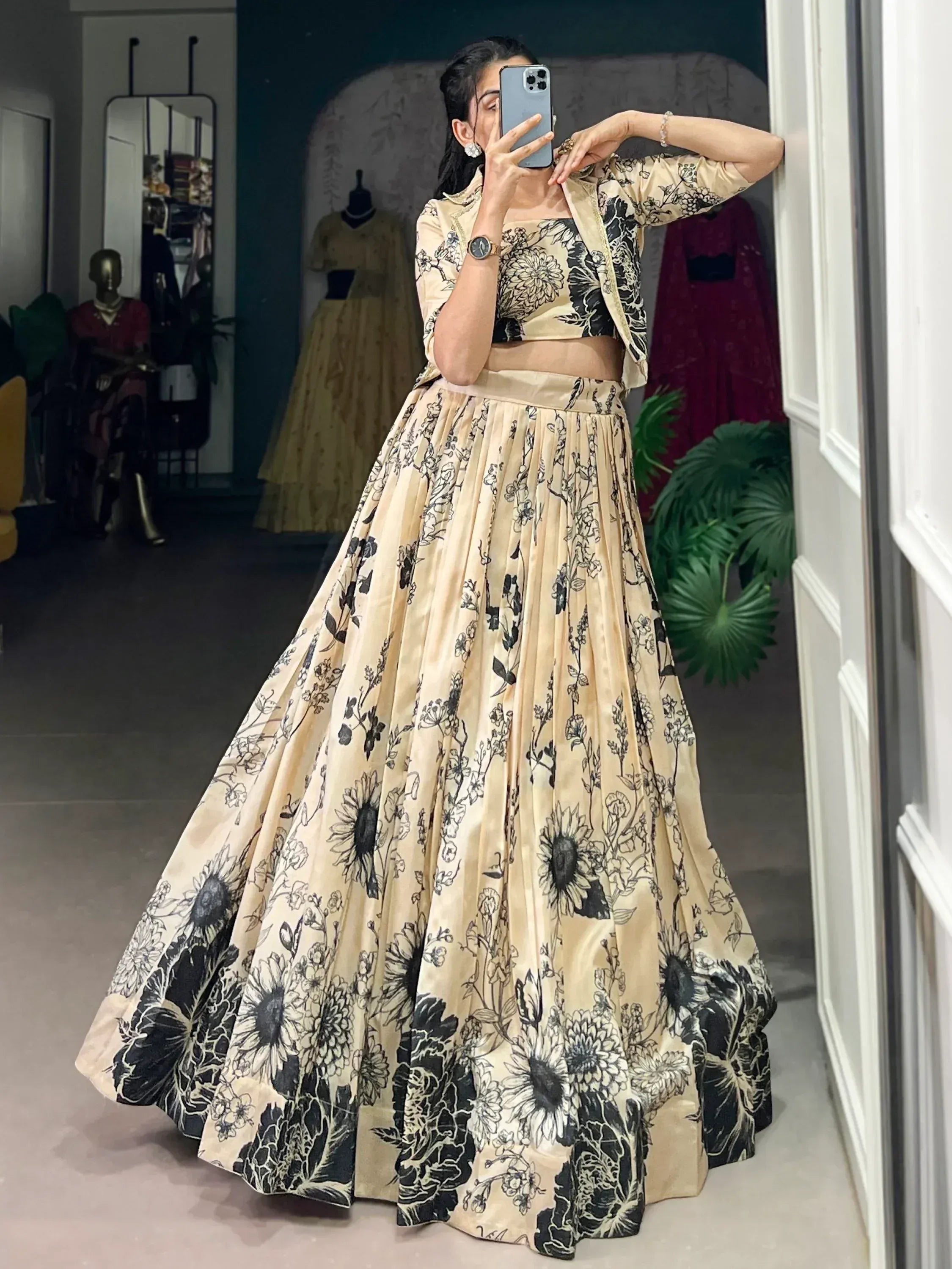 Beige and black floral lehenga choli with matching jacket, perfect for Indian ethnic wear occasions