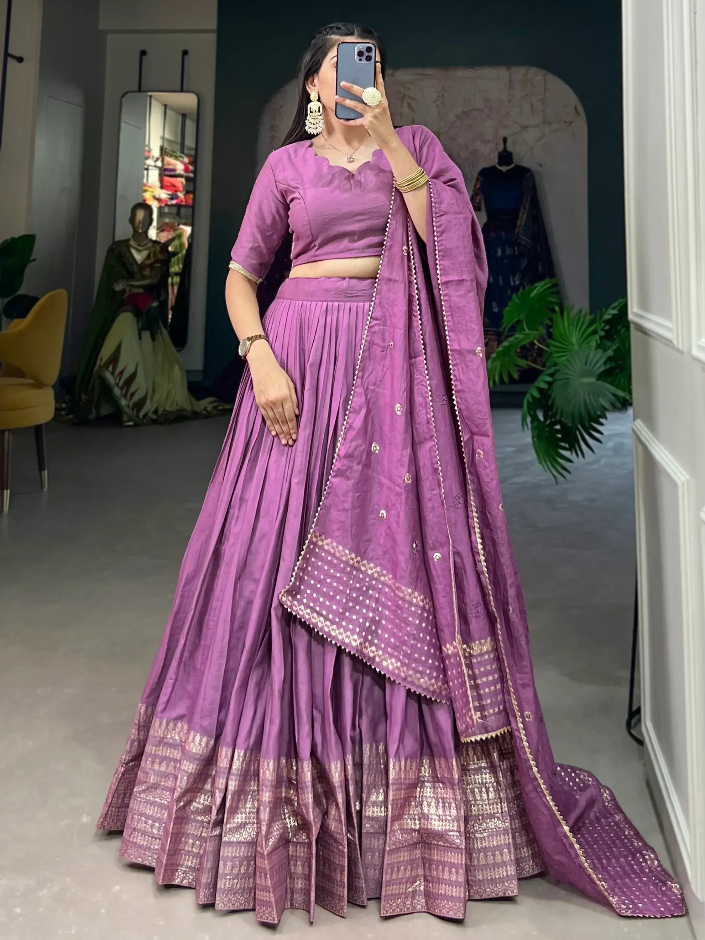 Purple designer lehenga choli with gold embroidery, perfect for Indian ethnic wear and festive occasions