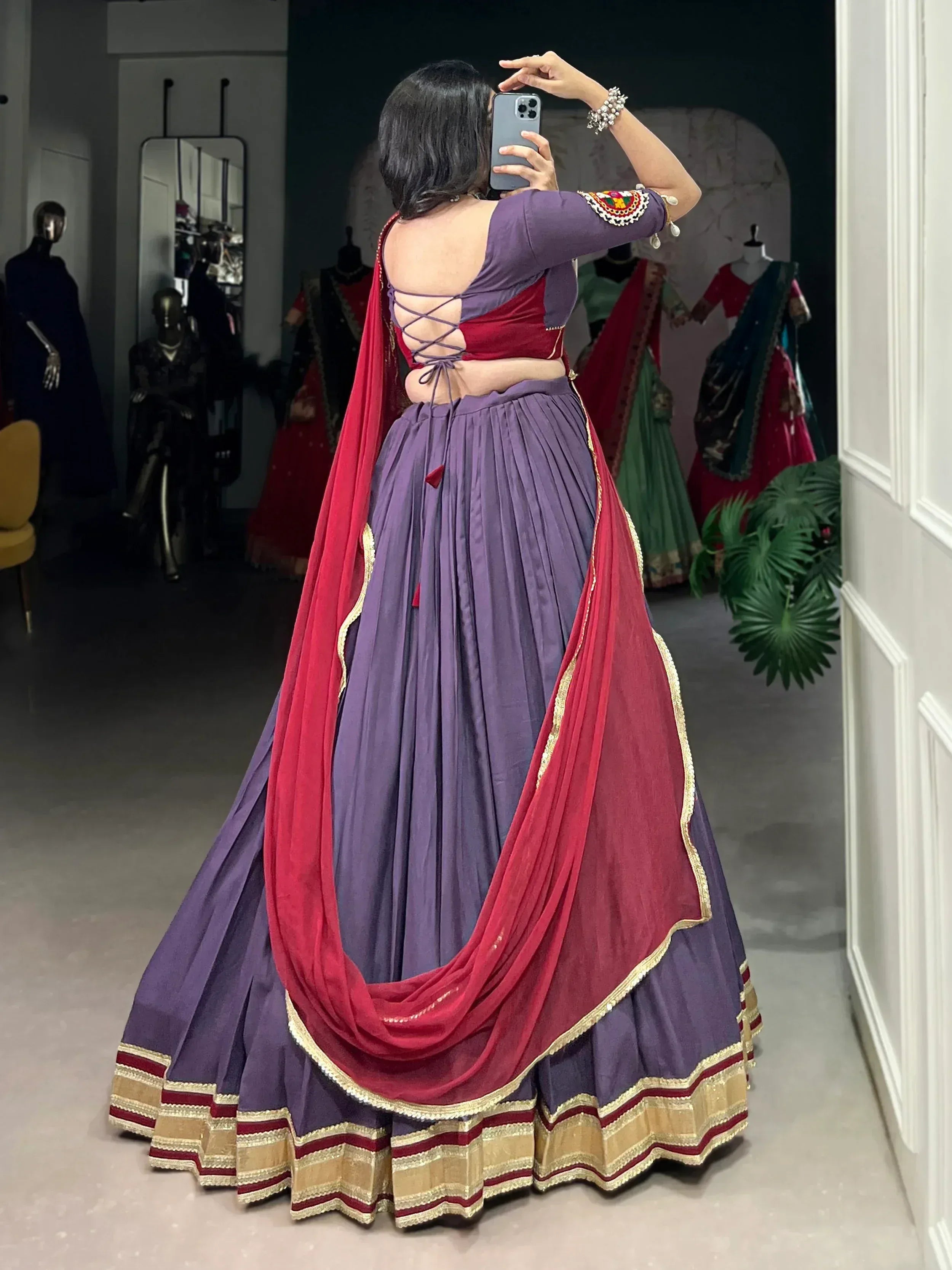 Purple and red designer lehenga choli with back tie-up, perfect for Indian ethnic wear events