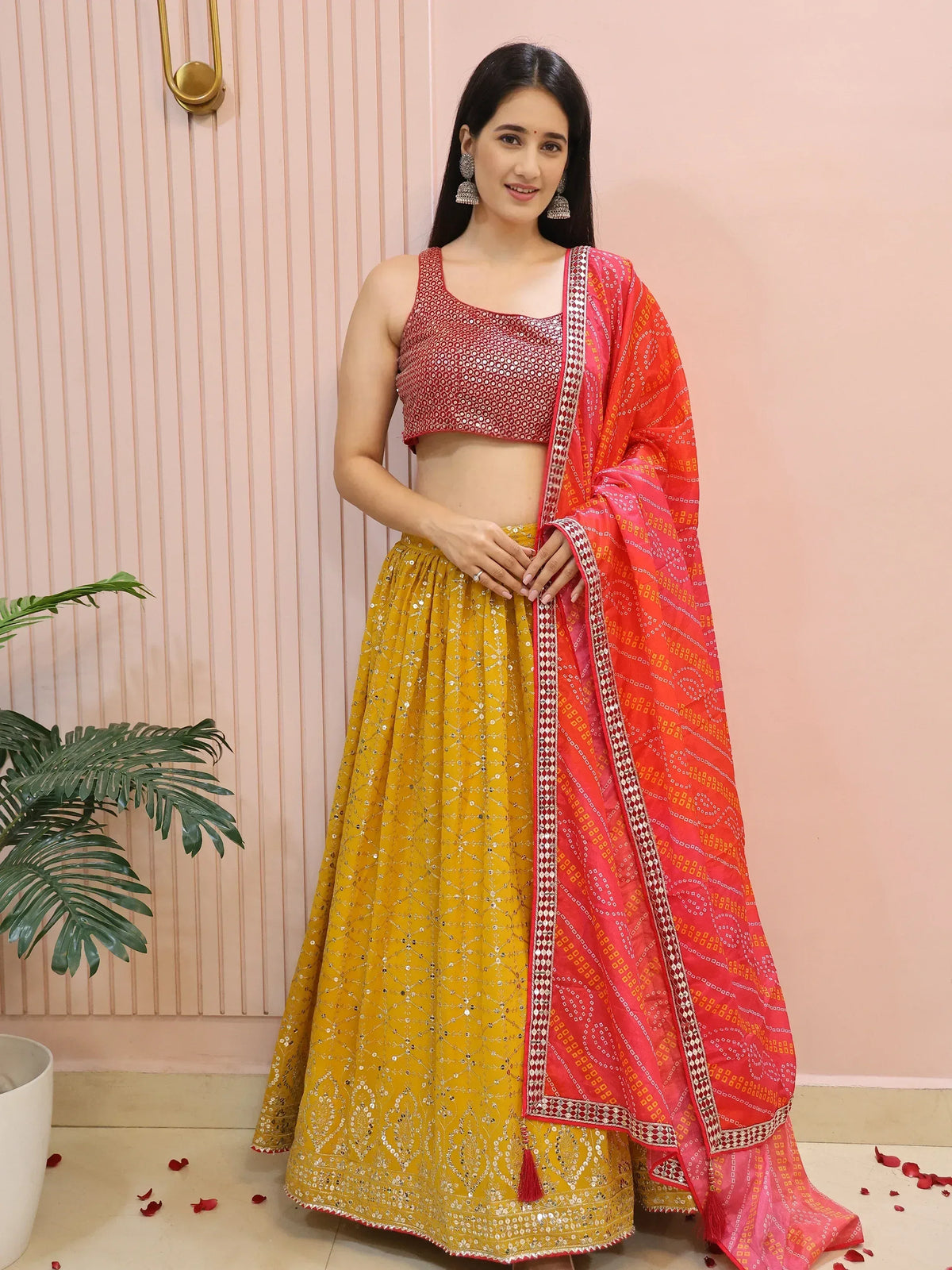 Yellow lehenga with red mirror work blouse and printed dupatta, Indian ethnic wear