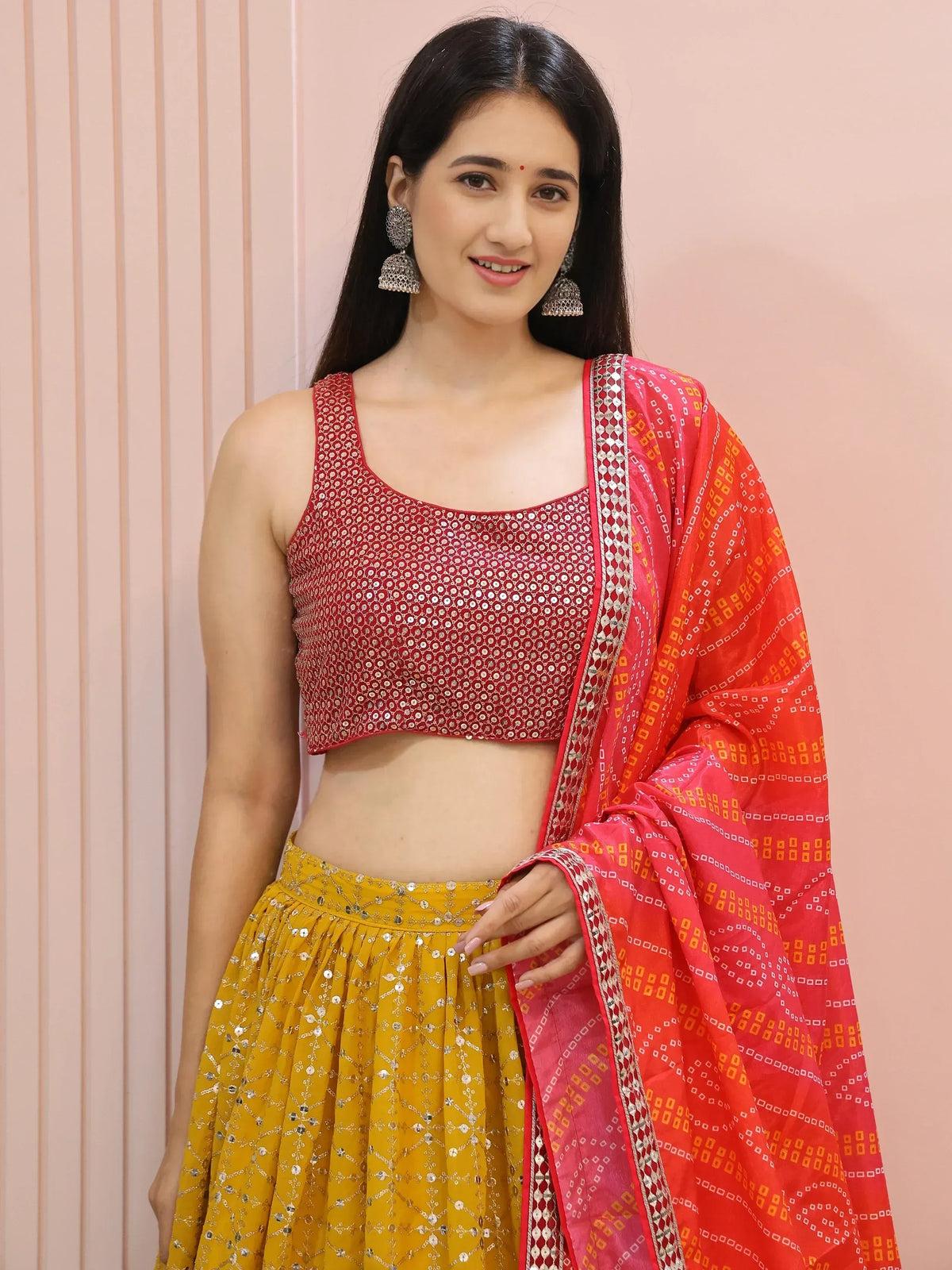 Red sequin crop top with yellow lehenga and orange dupatta, Indian ethnic wear