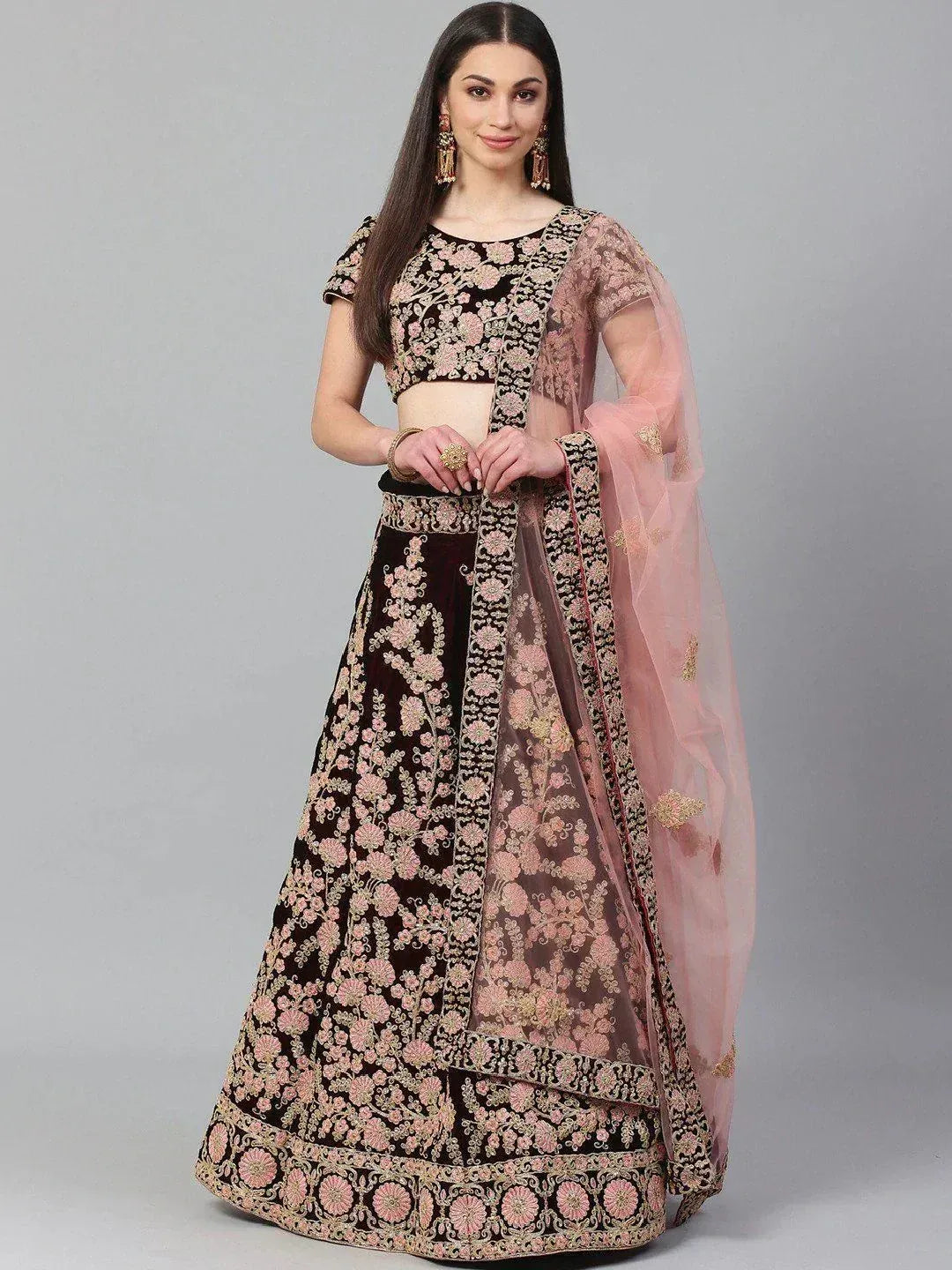Black and pink embroidered lehenga choli with floral design and sheer dupatta for Indian ethnic wear