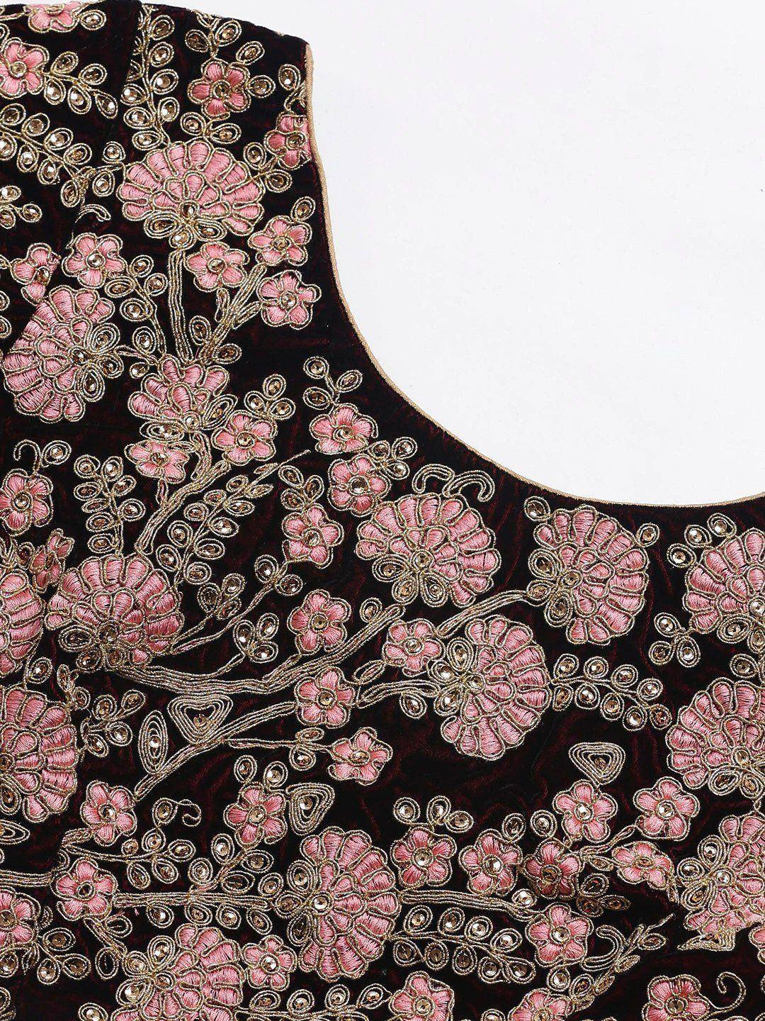 Black velvet ethnic top with pink floral embroidery and gold detailing, perfect for Indian wear.