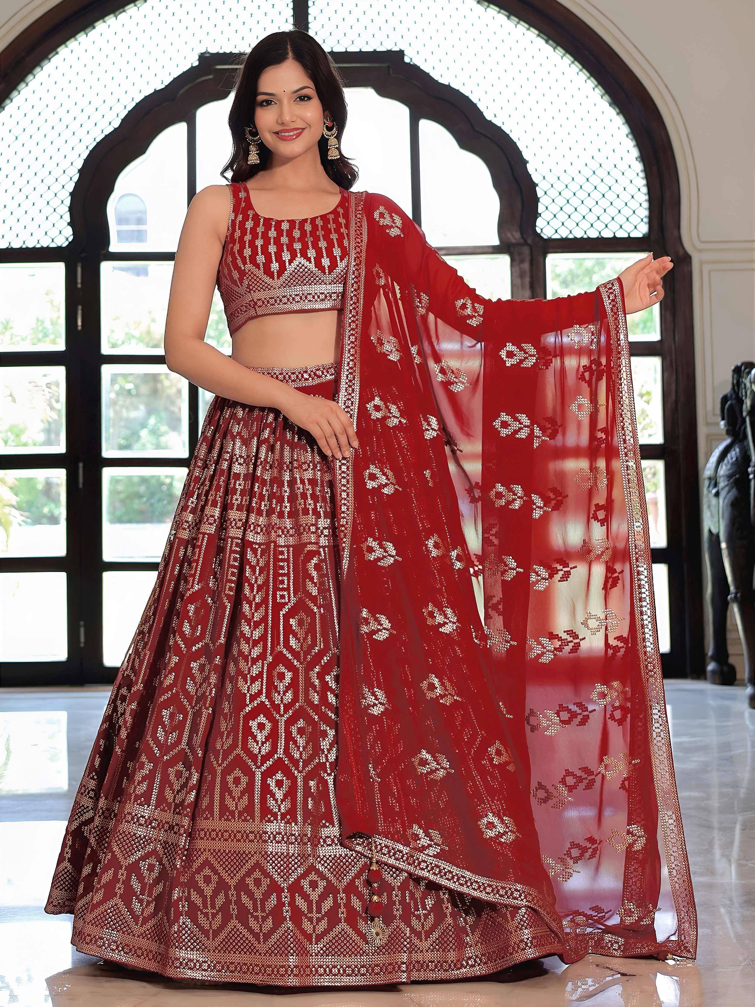 Red embroidered lehenga choli with sheer dupatta, Indian ethnic wear for weddings and festivals