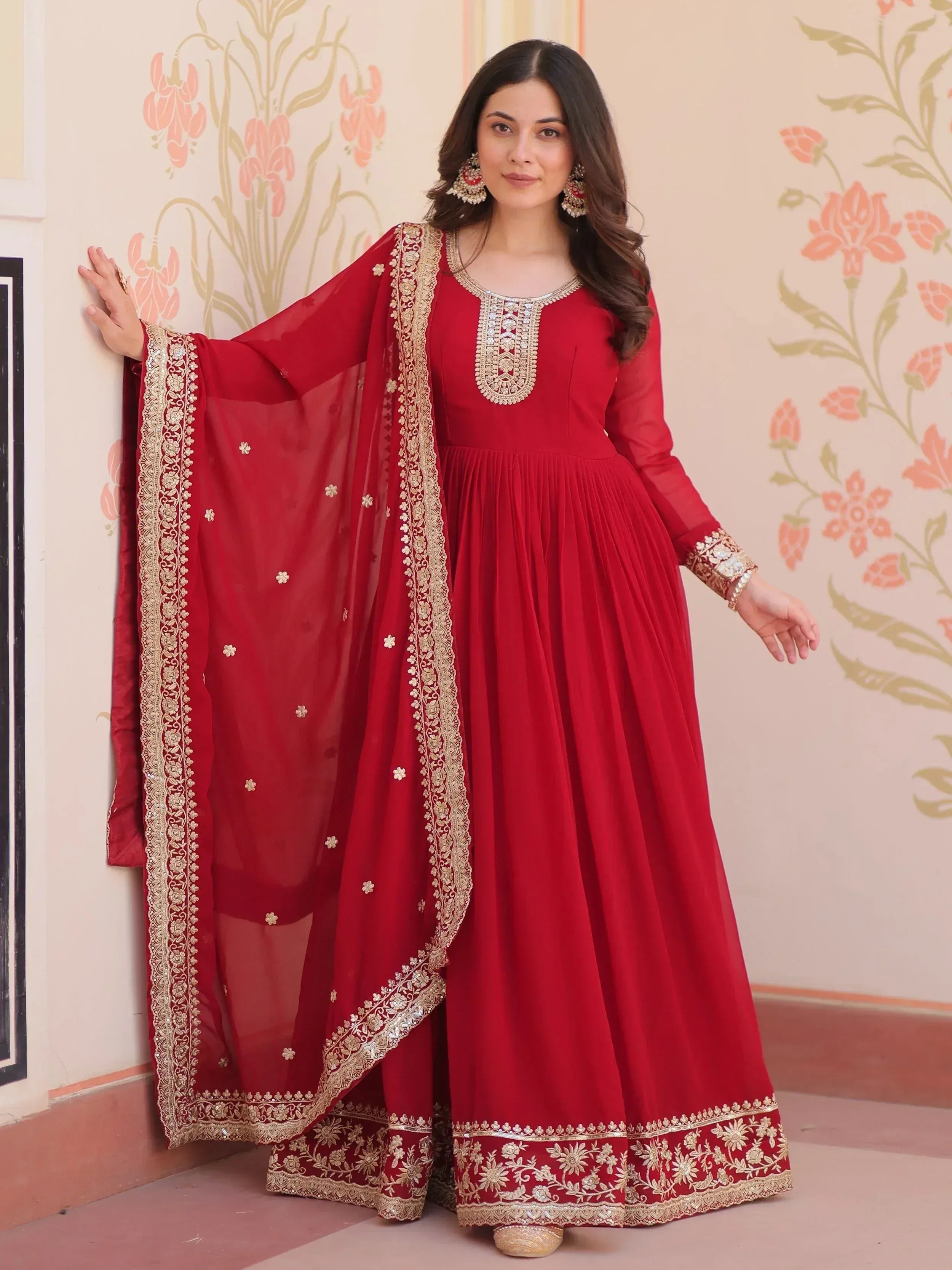 Red ethnic anarkali suit with gold embroidery and dupatta, perfect for Indian weddings and festive occasions