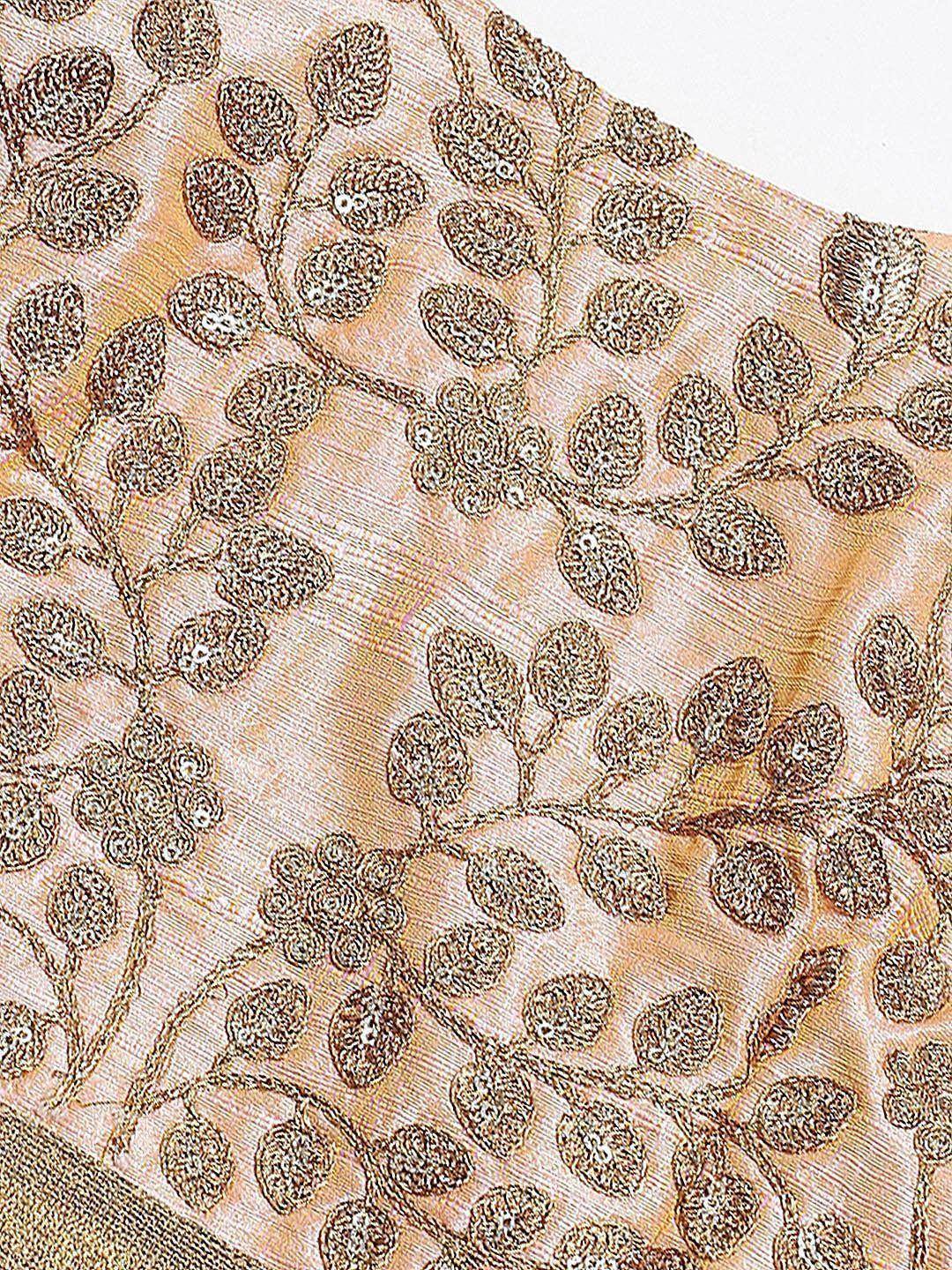 Golden embroidered floral design on ethnic wear fabric, perfect for lehenga choli or saree