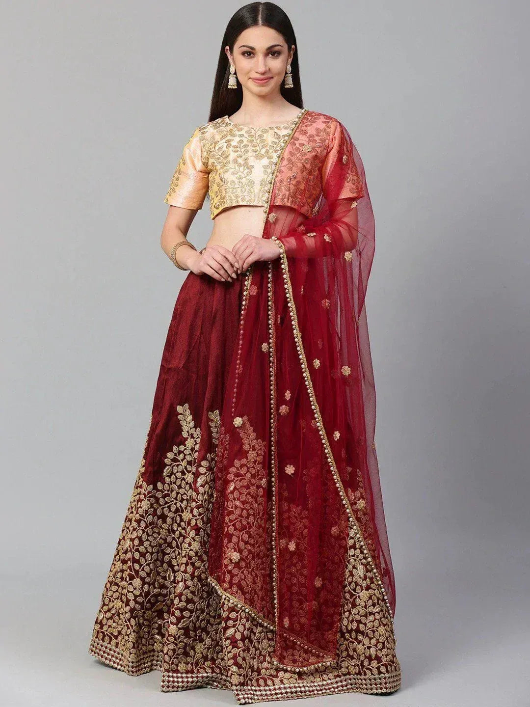 Maroon and gold embroidered lehenga choli with sheer dupatta, Indian ethnic wear for weddings and festivals