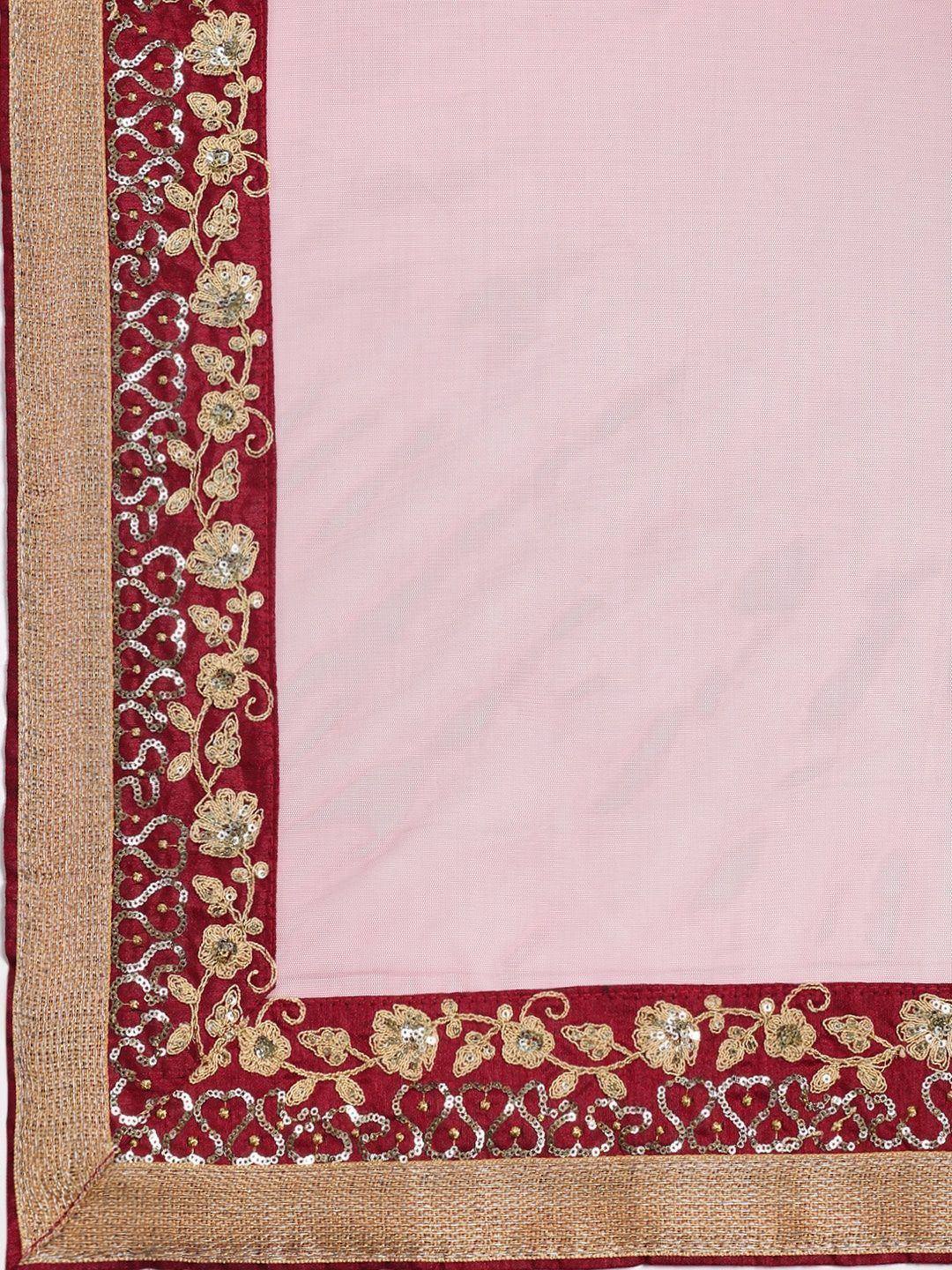 Pink ethnic saree with maroon border, gold floral embroidery, and sequin detailing