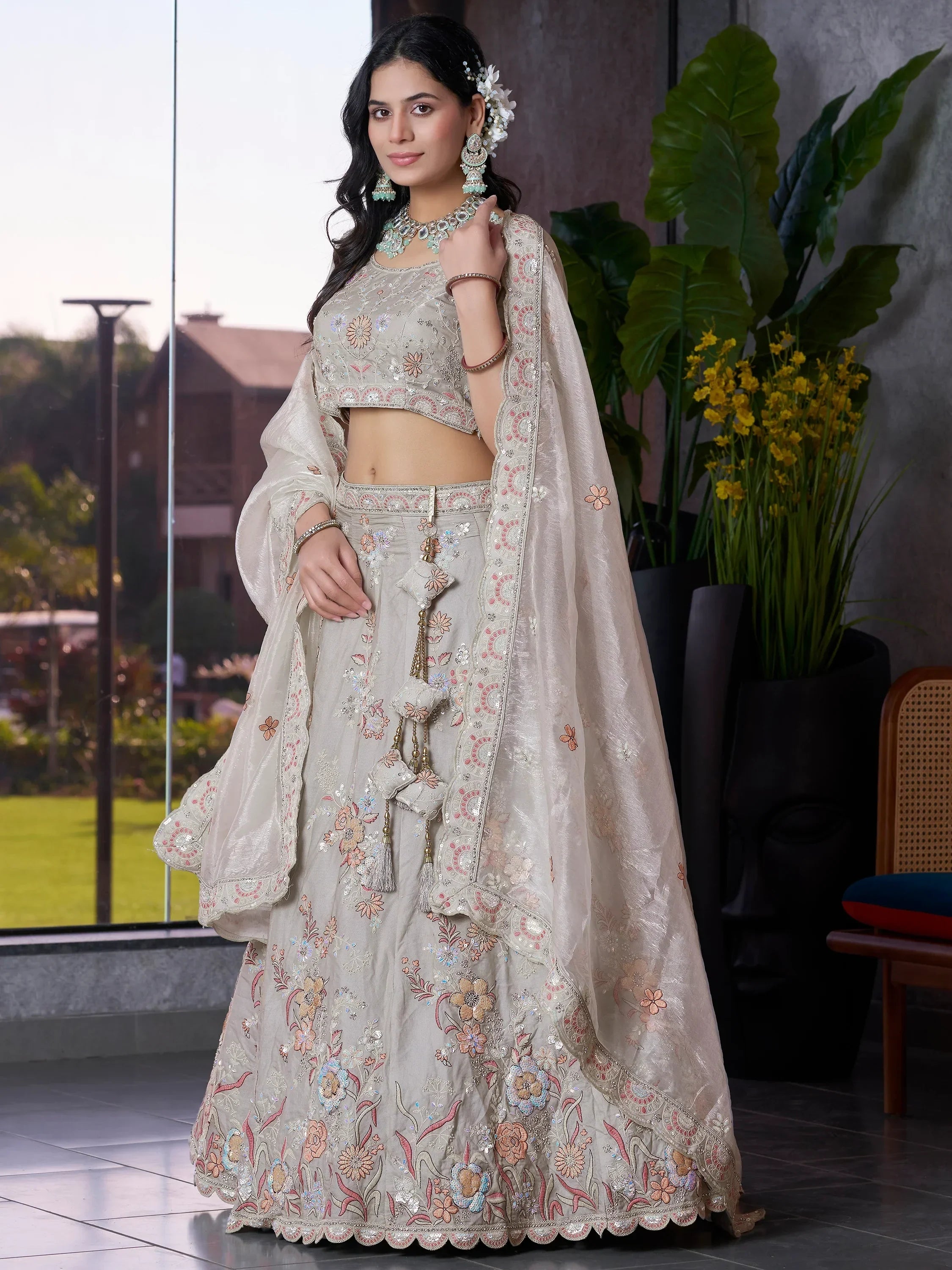 Beige floral embroidered lehenga choli with dupatta, perfect for Indian weddings and festive occasions