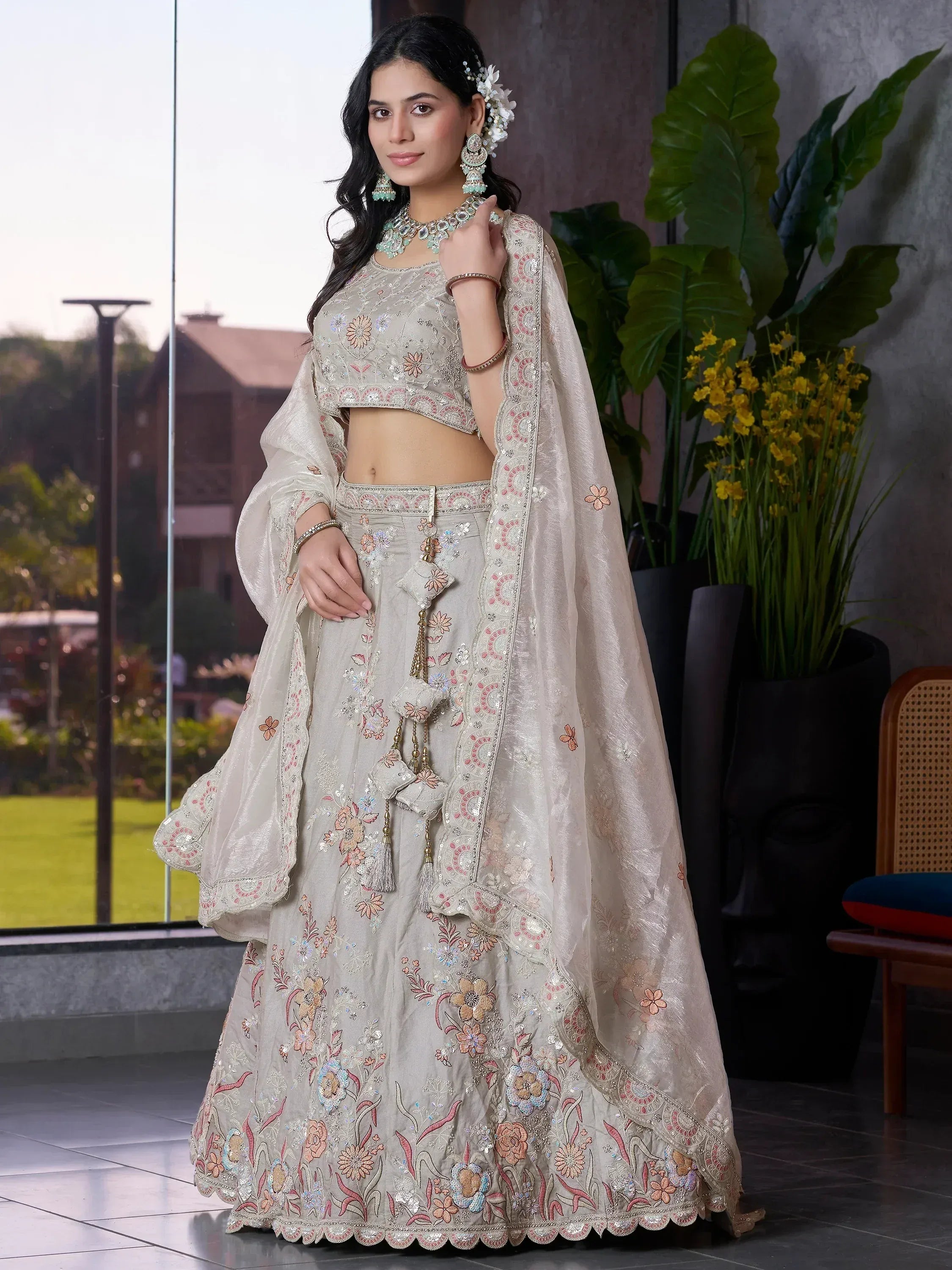 Beige floral embroidered lehenga choli with dupatta, perfect for Indian weddings and festive occasions