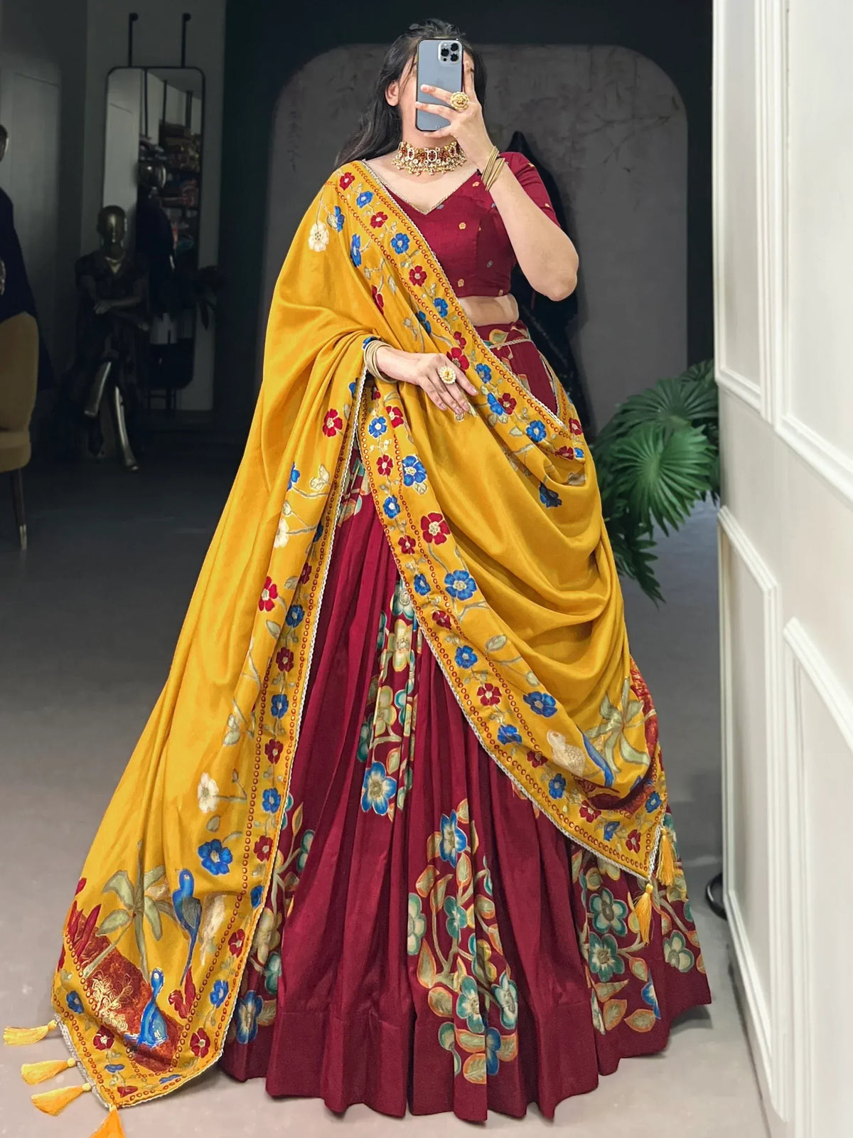Maroon lehenga choli with yellow floral dupatta, ethnic Indian wear for weddings and festivals
