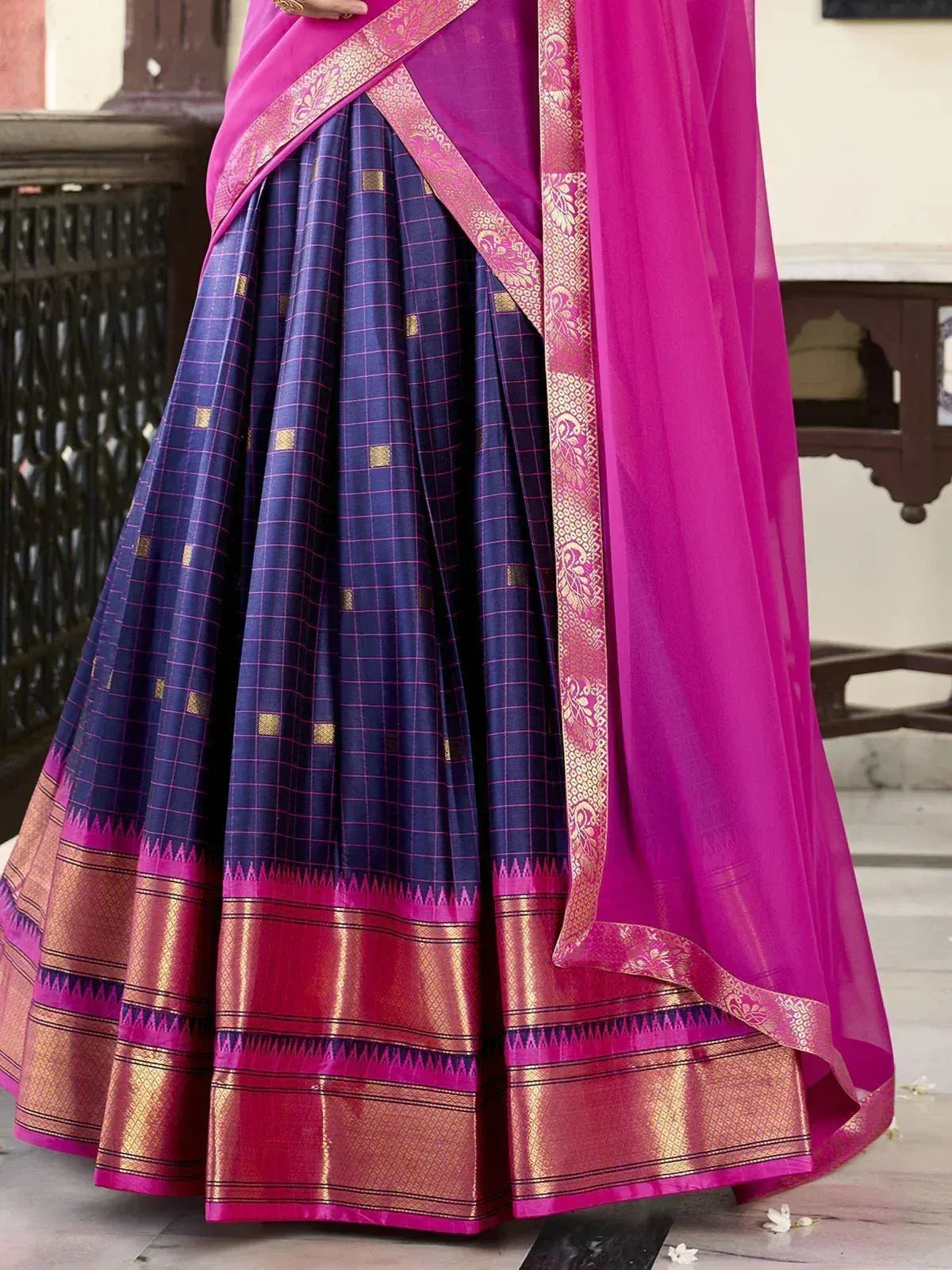 Purple and pink ethnic saree with gold checks and woven border, perfect for Indian occasions