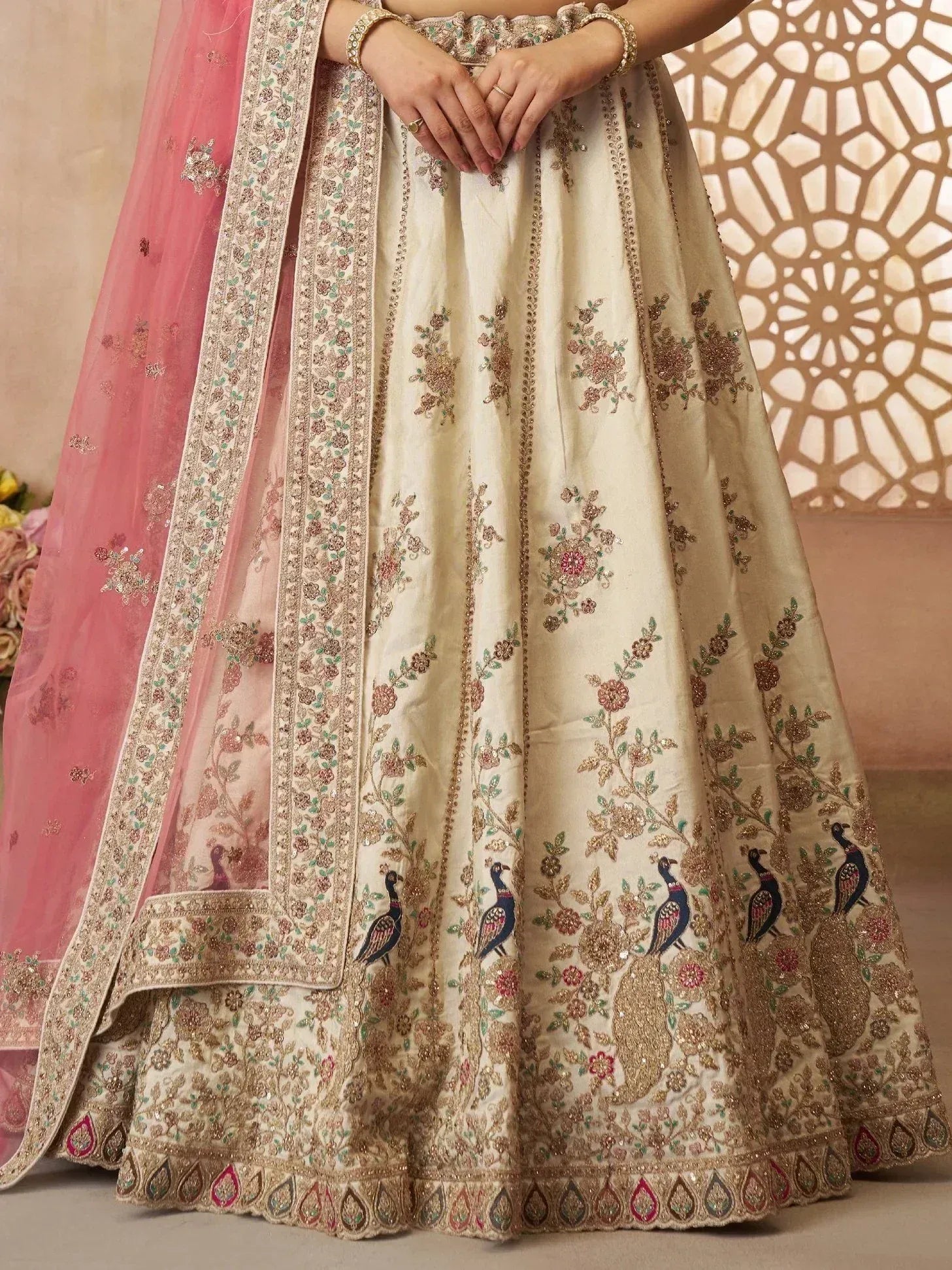 Cream lehenga with peacock embroidery and pink dupatta, Indian ethnic wear for weddings