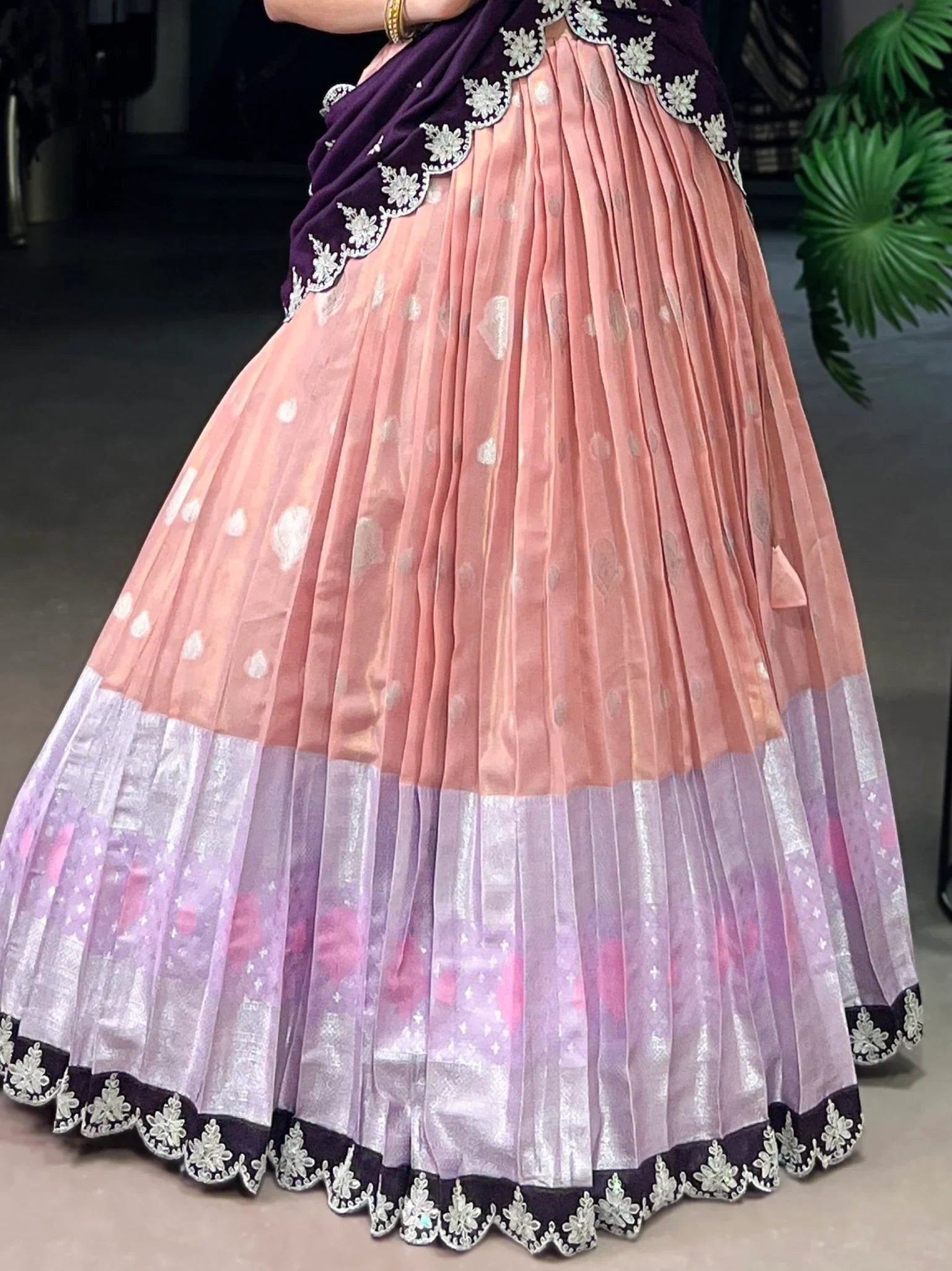 Pink and purple pleated lehenga with floral embroidery, perfect for Indian ethnic wear occasions