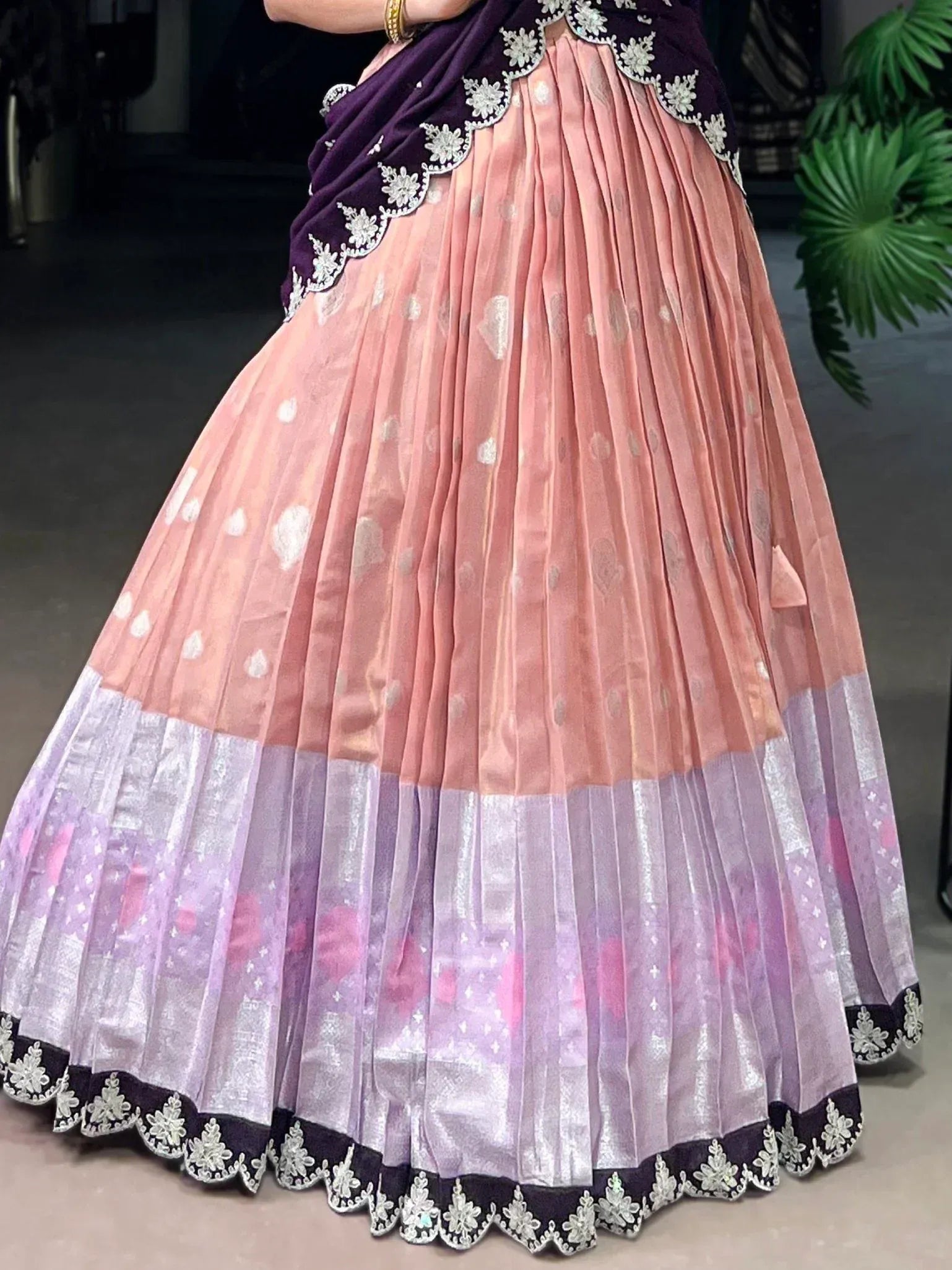Pink and purple pleated lehenga with floral embroidery, perfect for Indian ethnic wear occasions