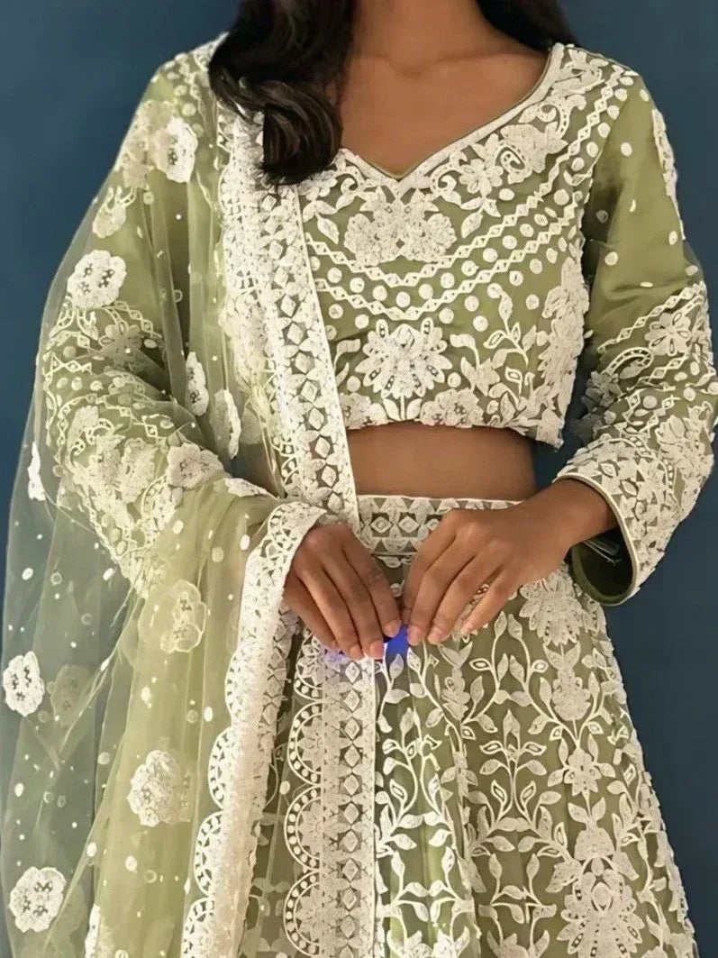 Olive green embroidered lehenga choli with floral lace and sheer dupatta, perfect for Indian ethnic wear