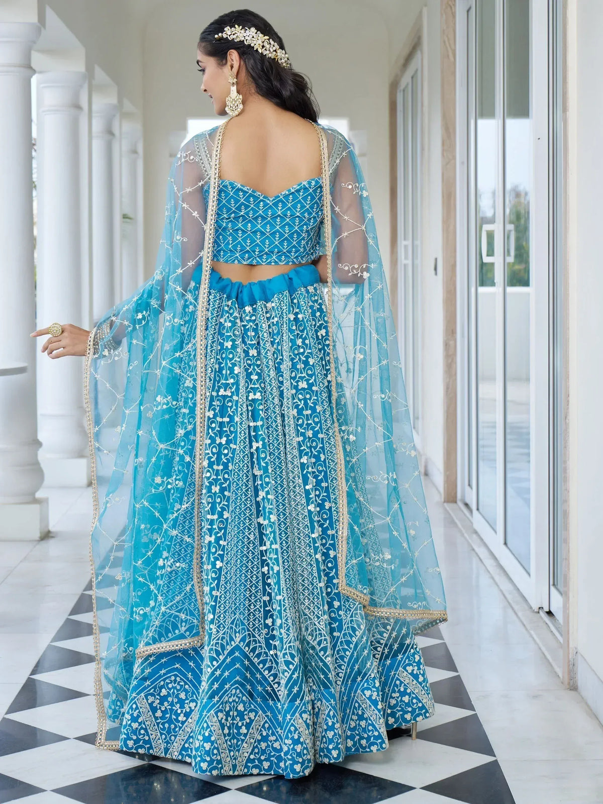 Blue embroidered lehenga choli with sheer dupatta, perfect for Indian ethnic wear occasions