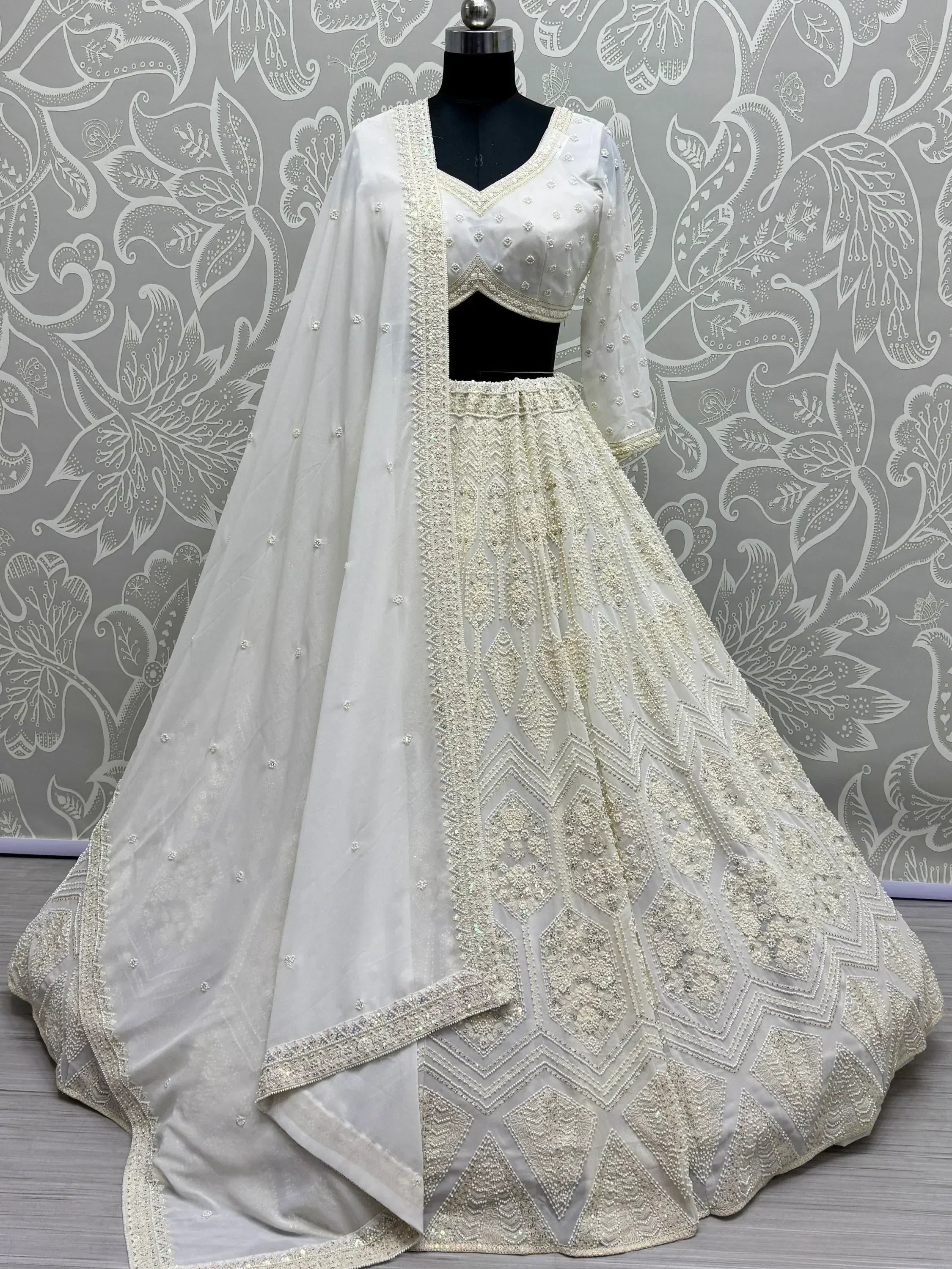 White designer lehenga choli with heavy embroidery and dupatta, Indian ethnic wear for weddings