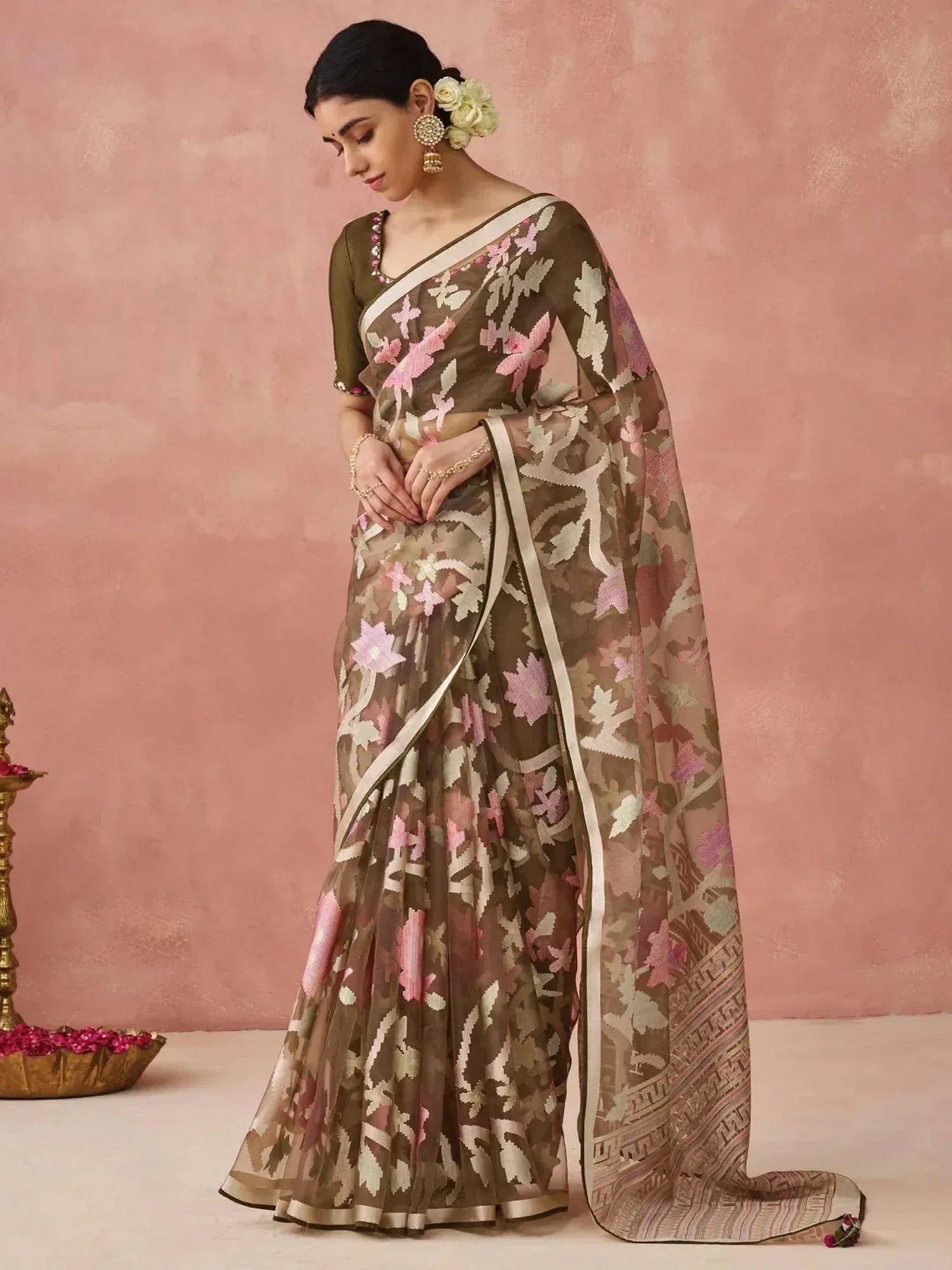 Elegant floral print saree with pink and beige motifs, paired with olive blouse, perfect for ethnic occasions.