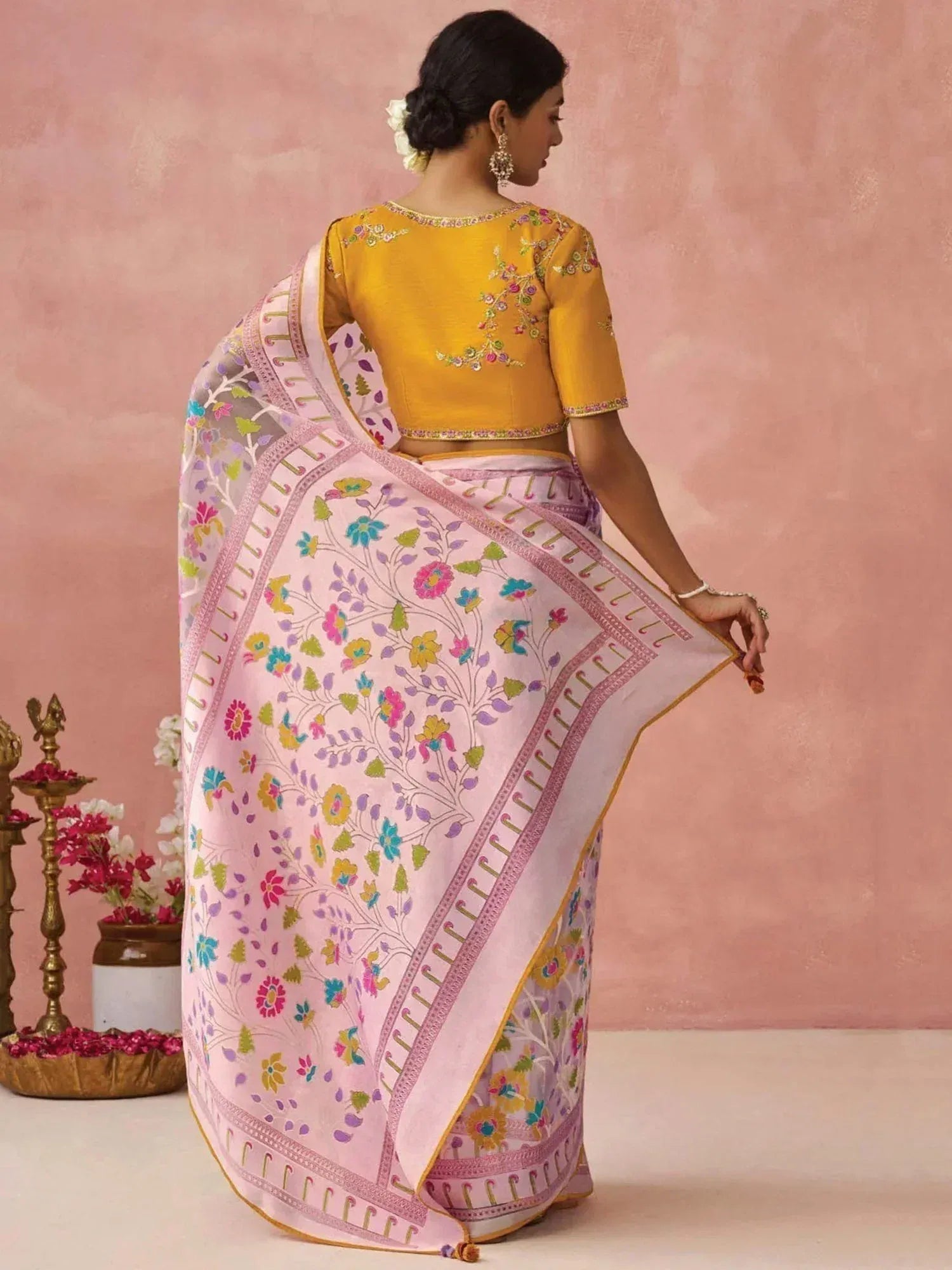 Woman in floral pink saree with yellow embroidered blouse, Indian ethnic wear