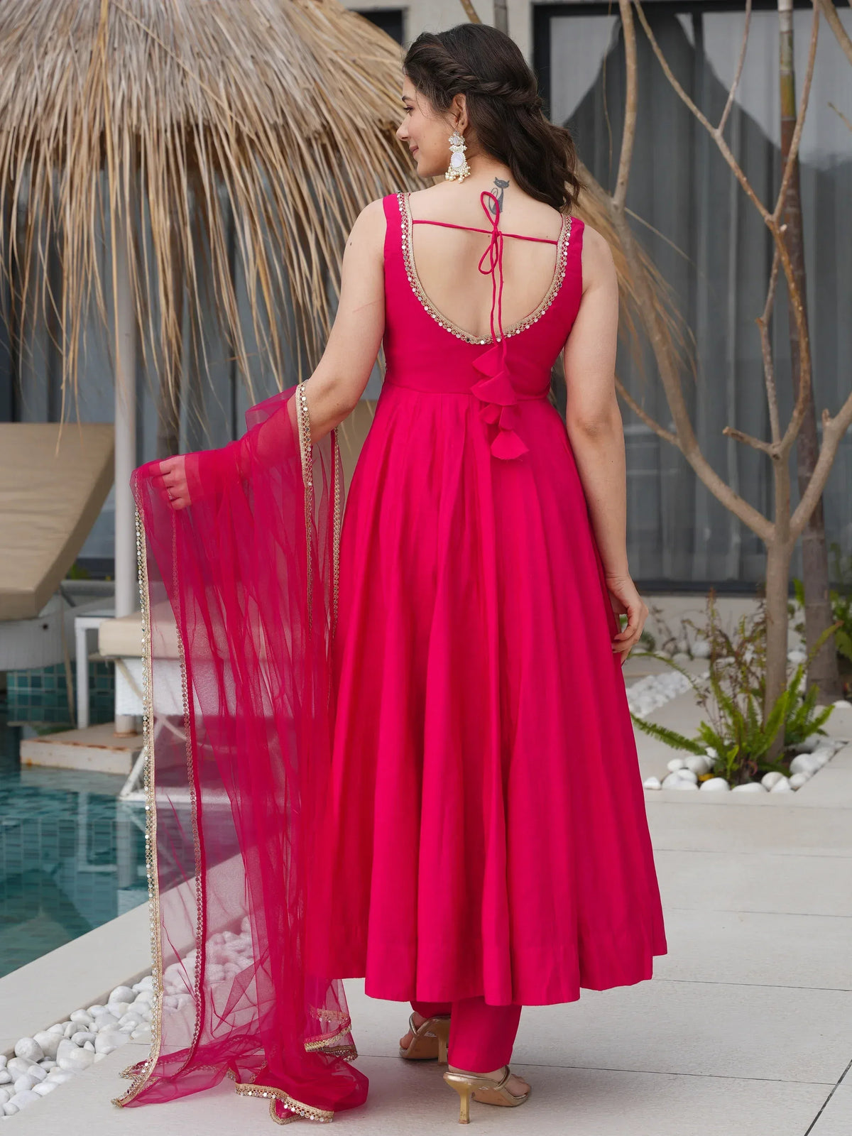 Fuchsia ethnic gown with back tie & sheer dupatta, perfect for Indian occasions