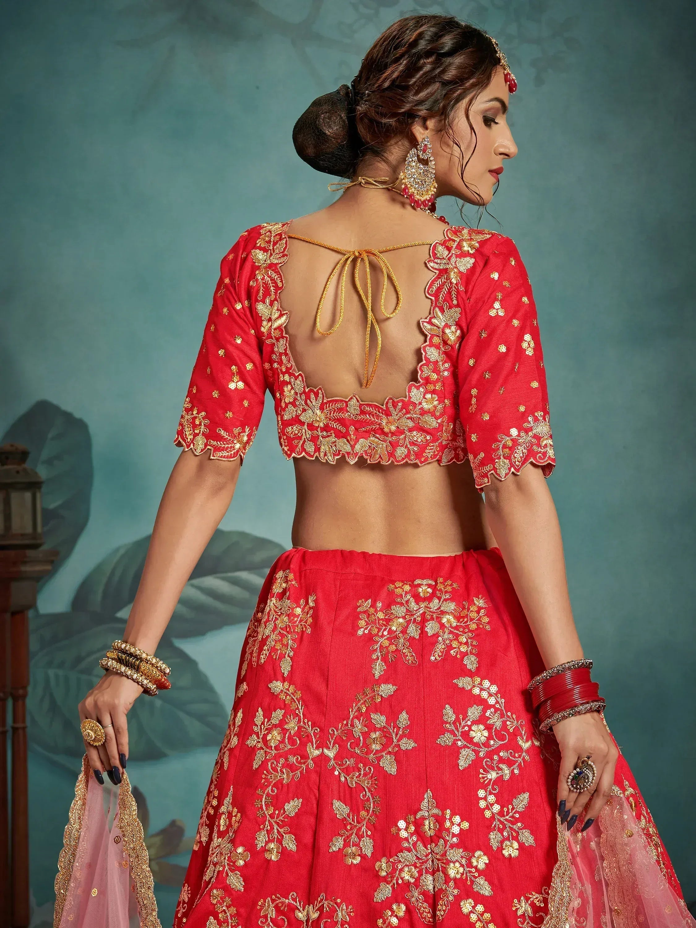 Red embroidered lehenga choli with gold floral work, back tie blouse, and matching dupatta for Indian ethnic wear