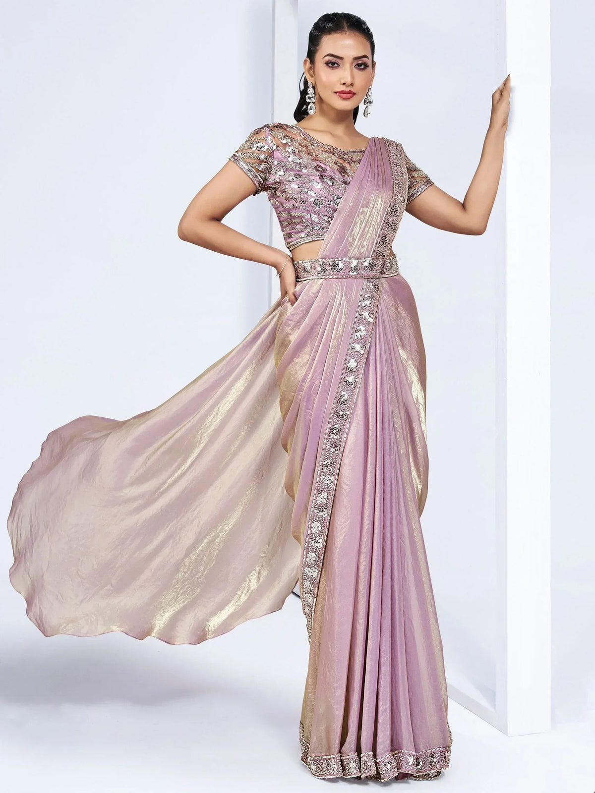 Elegant lavender lehenga choli with sequin embroidery and flowing dupatta, perfect for Indian ethnic occasions.