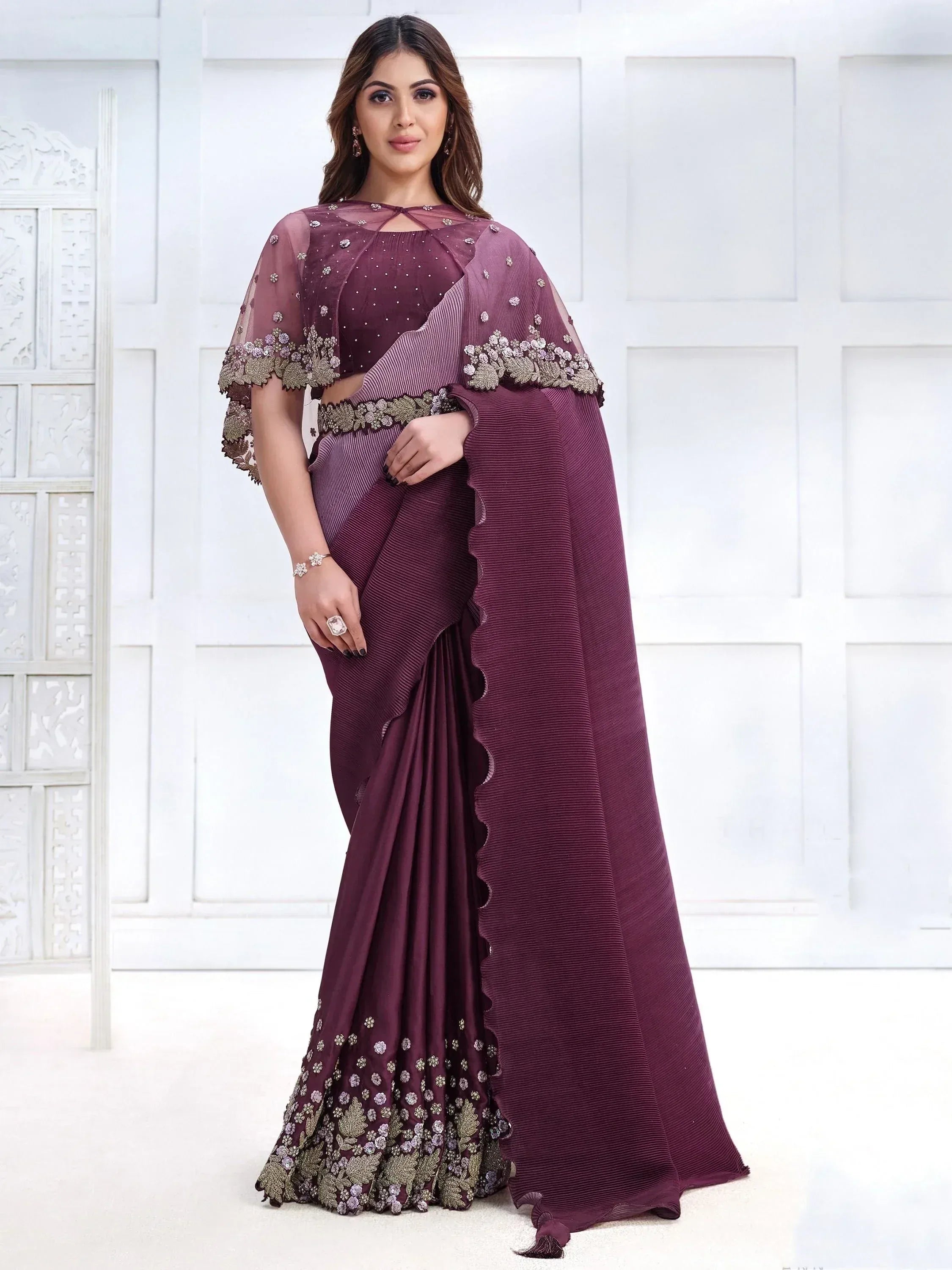 Elegant maroon saree with floral embroidery and sheer cape, perfect for Indian ethnic occasions