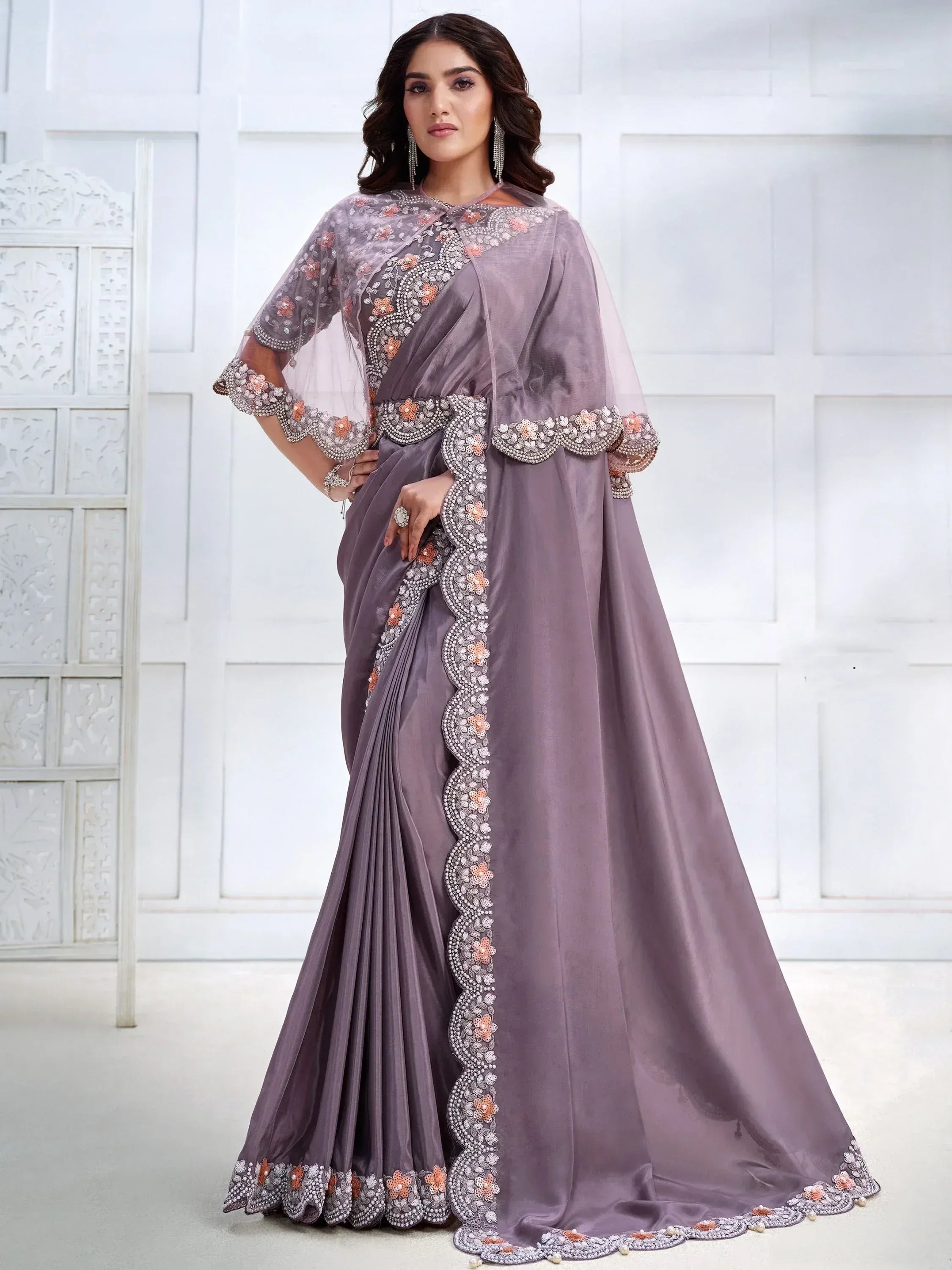 Elegant lavender saree with floral embroidery and sheer cape, perfect for Indian ethnic occasions