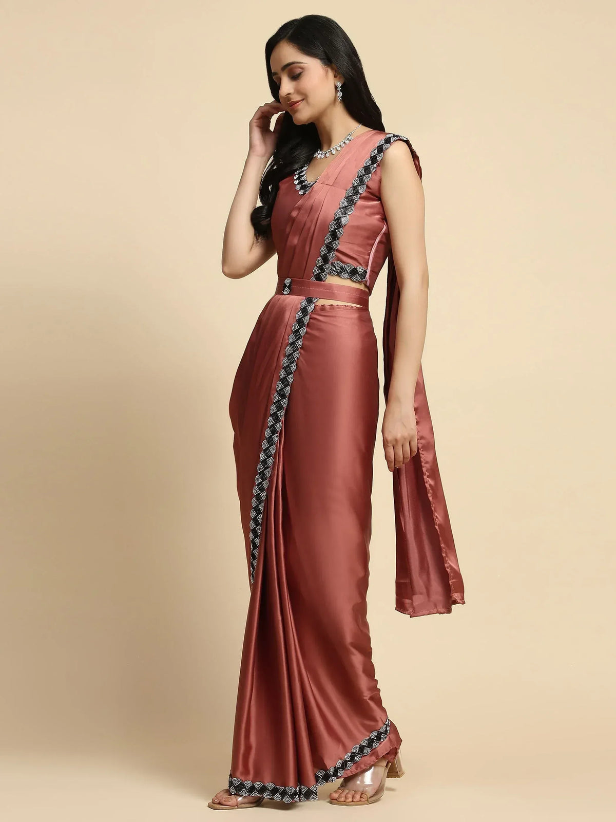 Dusty rose satin saree with black white embroidered border, sleeveless blouse, ethnic wear