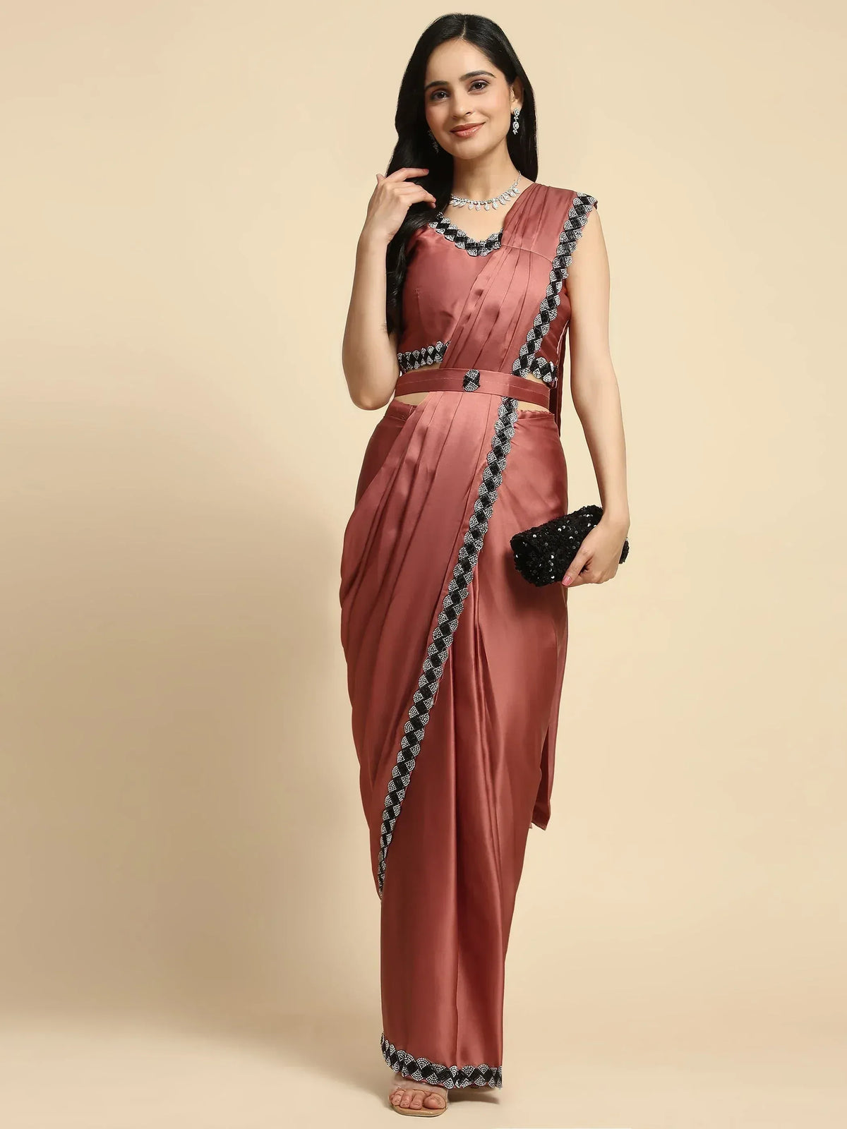 Dusty rose satin saree gown with black white embroidery, perfect for Indian ethnic wear occasions