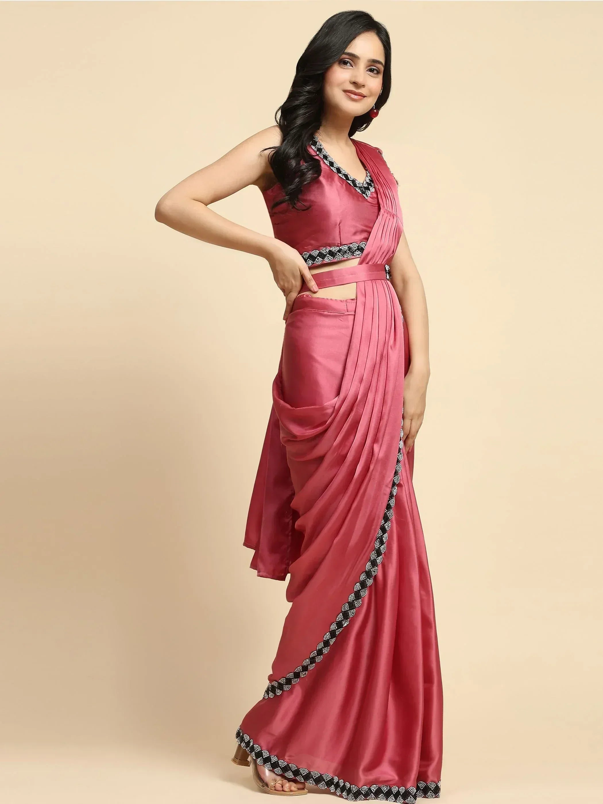 Pink satin saree with black and white border, stylish ethnic wear for women
